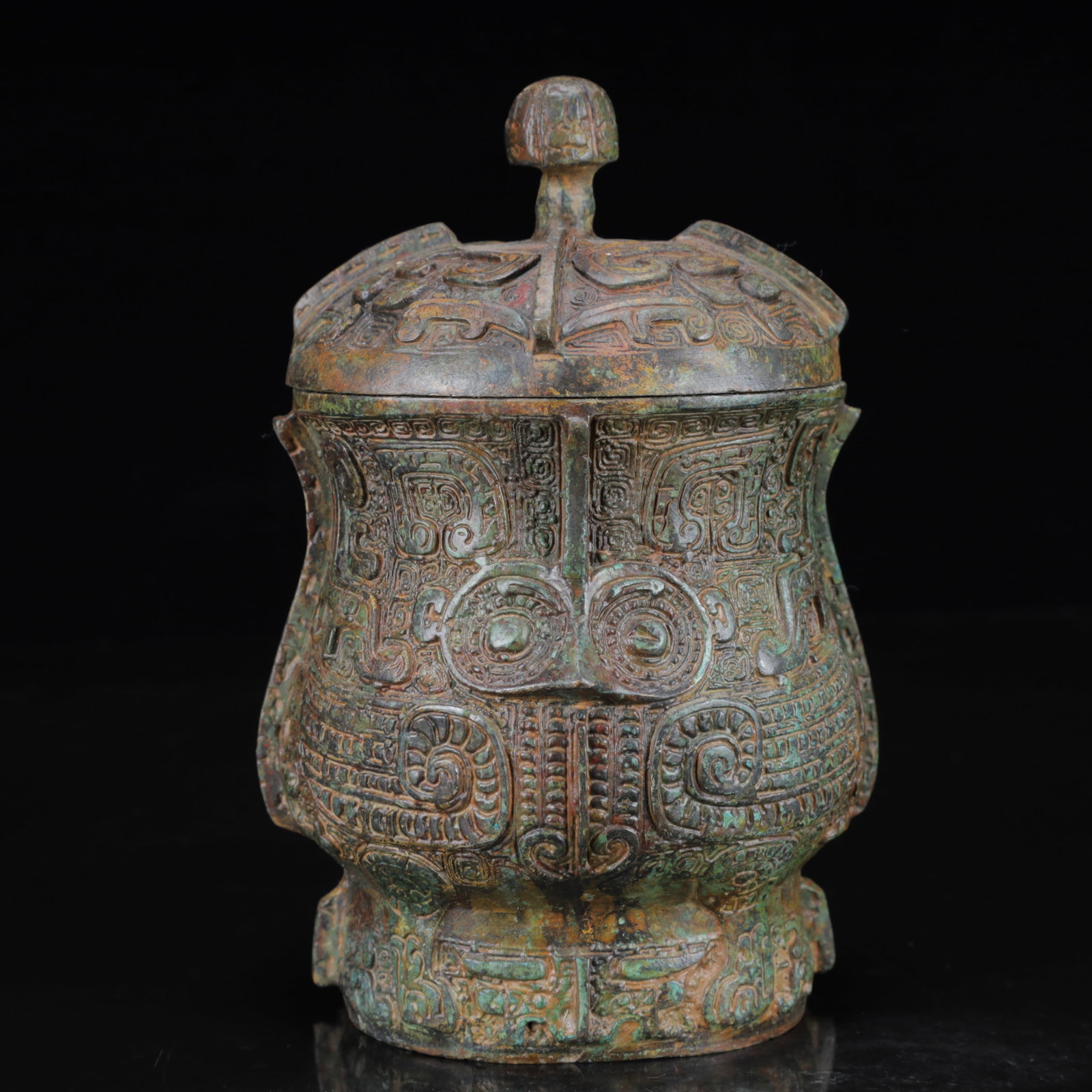 An Archaic Bronze Beast-Face Pattern Cover Jar,with Inscription: An Archaic Bronze Beast-Face Pattern Cover Jar,with Inscription,the Warring States Period in China,Size:4.7inx7.5in,Weight:1650g