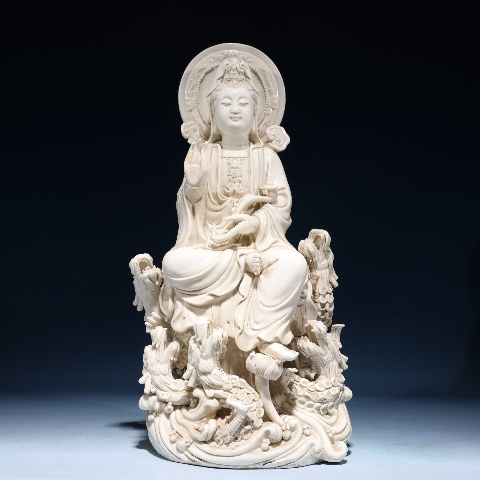A Solemn Blance-De-Chine Statue of Avalokitesvara: A Solemn Blance-De-Chine Statue of Avalokitesvara Blance-De-Chine Statue of Avalokitesvara,Ming Dynasty,China,He Chaozong Mark,Size:9.4inx9.1inx19.3in,Weight:5750g 德化瓷观&