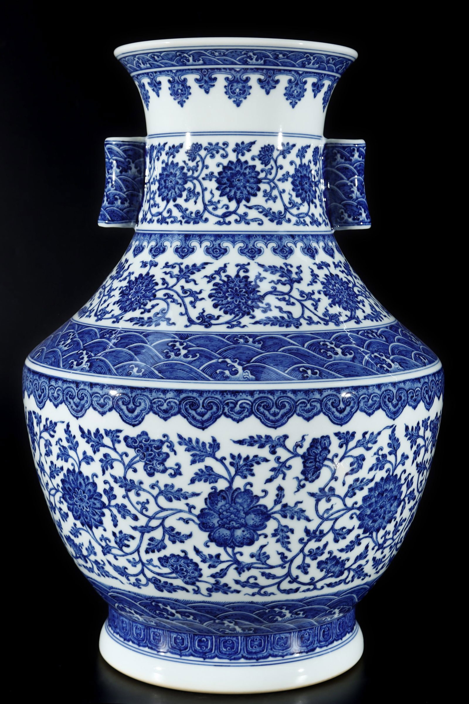 A Huge Blue and White Lotus Pattern Double-Ears Vase: A Huge Blue and White Lotus Pattern Double-Ears Vase,Qing Dynasty,China,Qianlong Six-character Mark,Size:22.4inx16.1in 青花缠枝莲纹双耳瓶中&