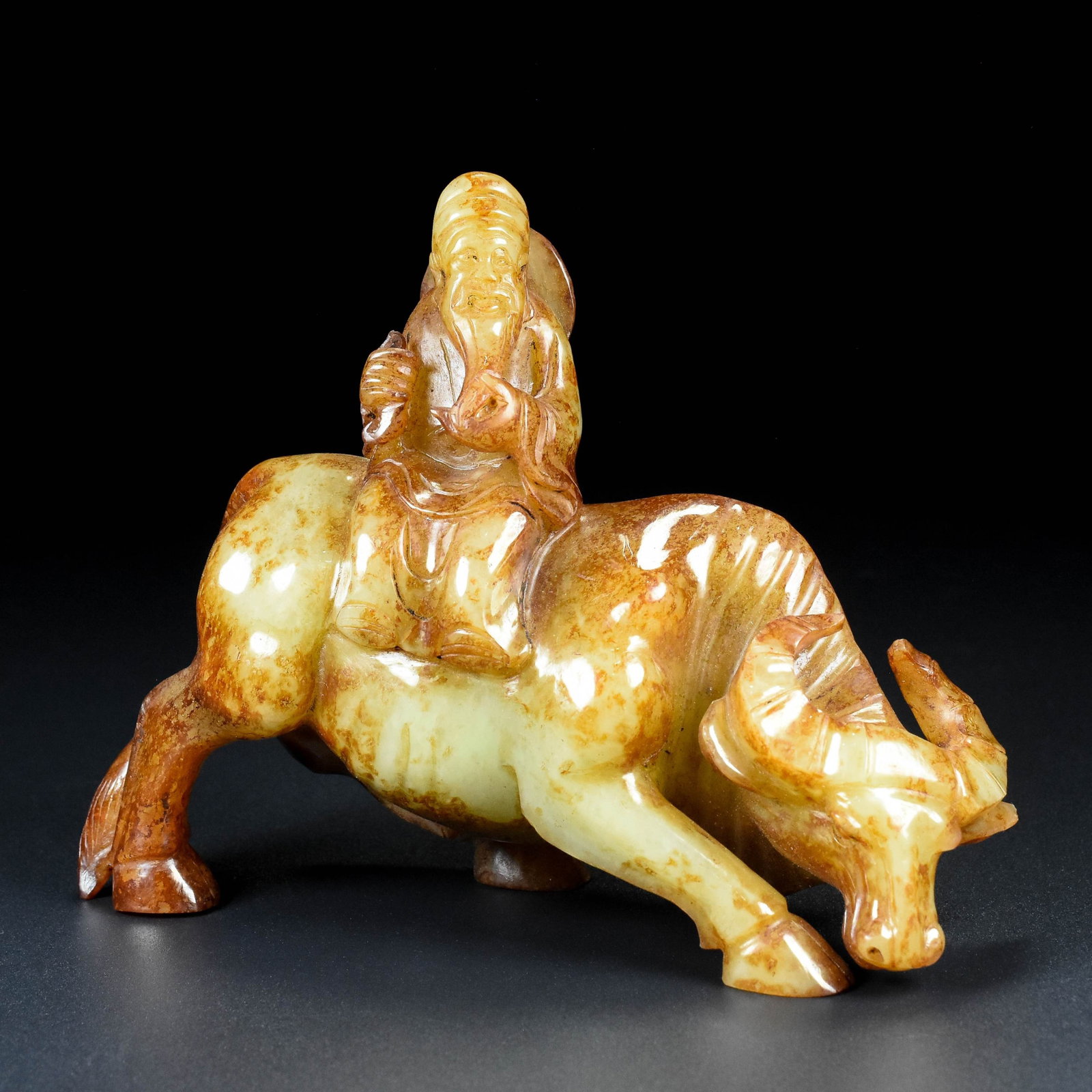 An Exquisite White Jade Figure Riding Buffalo Ornament: An Exquisite White Jade Figure Riding Buffalo Ornament,Qing Dynasty,China,Size:5.1inx6.3inx2.4in,Weight:693g 白玉人物骑牛摆件,中国清&#