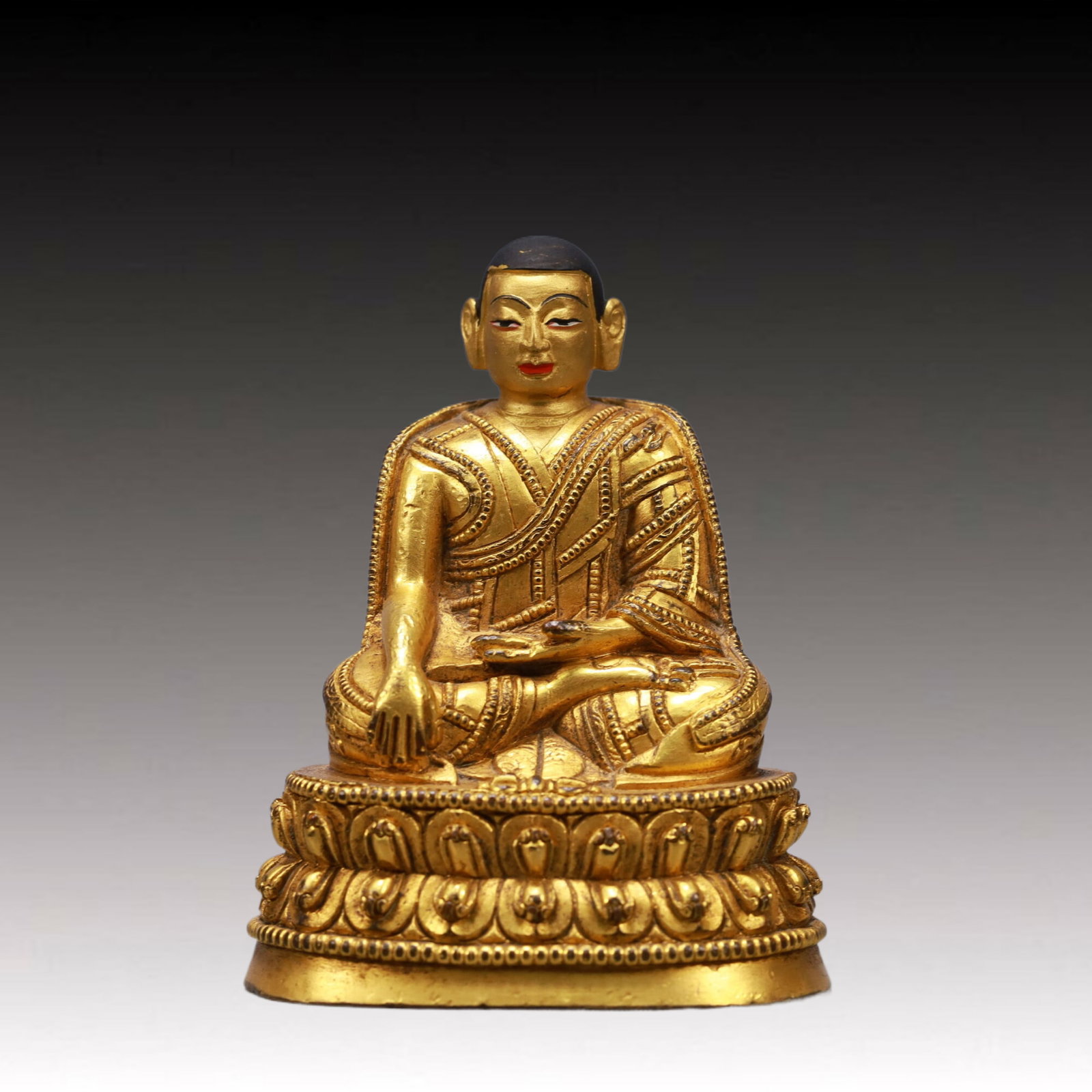 A Solemn Gilt Bronze Statue of Guru: A Solemn Gilt Bronze Statue of Guru,Qing Dynasty, China,Size:2.6inx2inx3.7inWeight:350g 铜鎏金上师像,中国清代
