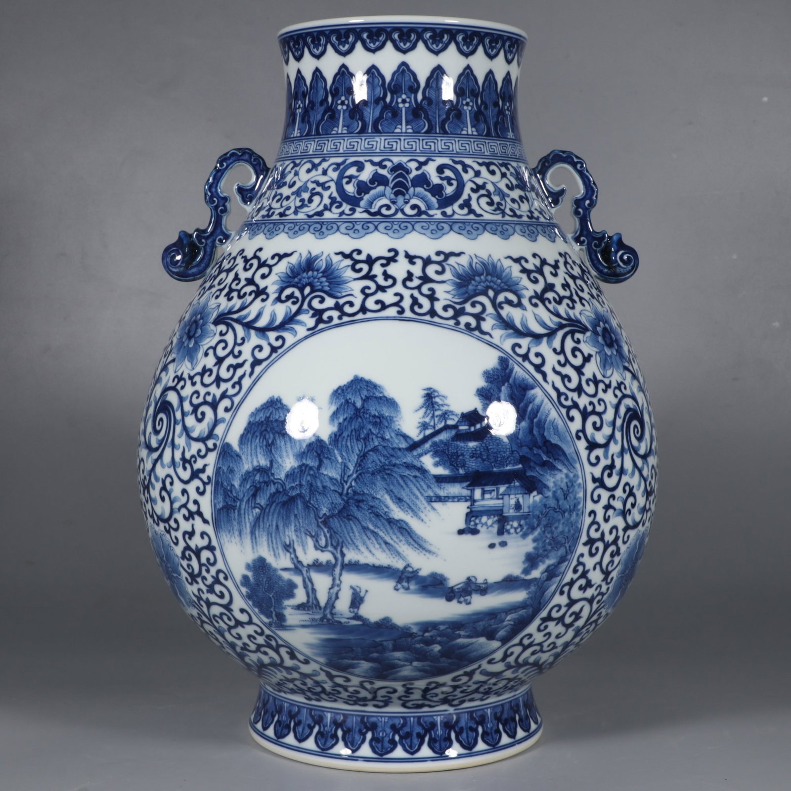A Rare Blue and White Landscape and Figure Pattern Double-Ears Vase: A Rare Blue and White Landscape and Figure Pattern Double-Ears Vase,Qing Dynasty,China,Qianlong Six-character Mark,Size:14.2inx9.8in 青花山水人物纹双