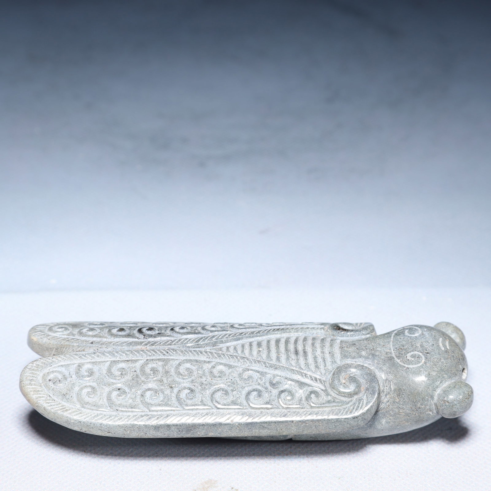 An Archaic Archaic Jade Cicada Ornament: An Archaic Archaic Jade Cicada Ornament,Ancient Time,China,Size:4.7inx1.8inx1in,Weight:200g 高古玉蝉摆件,中国远古时期