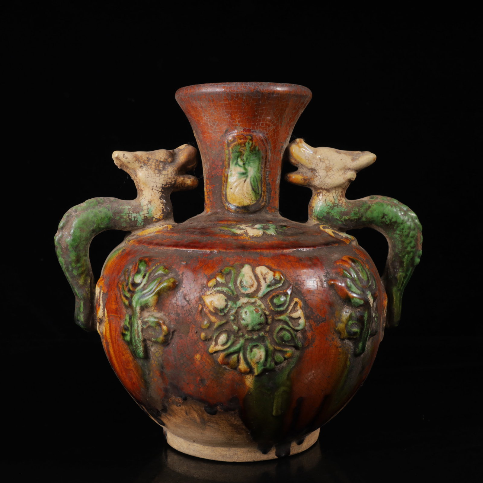 An Exquisite Tang Tri-Color Glazed Pottery Dragon Pattern Double-Ears Vase: An Exquisite Tang Tri-Color Glazed Pottery Dragon Pattern Double-Ears Vase,Tang Dynasty,China,Size:9.4inx7.1inx9.1in,Weight:1500g