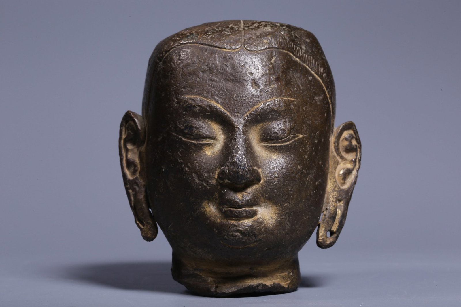A Rare Bronze Guru's Head: A Rare Bronze Guru's Head,Qing Dynasty, China,Size:3.5inx3inx3.1in,Weight:438g 铜上师佛头,中国清代
