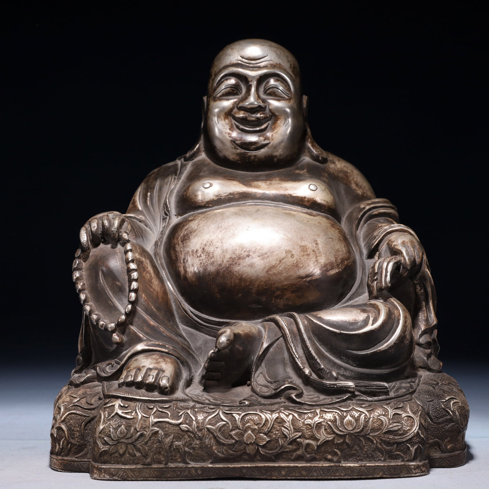 A Solemn Silver-plated Bronze Lotus Pattern Statue of Maitreya Buddha: A Solemn Silver-plated Bronze Lotus Pattern Statue of Maitreya Buddha,Qing Dynasty,China,Size:8.7inx7.9inx10.2in,Weight:3350g 铜镀银缠枝莲纹弥勒&#