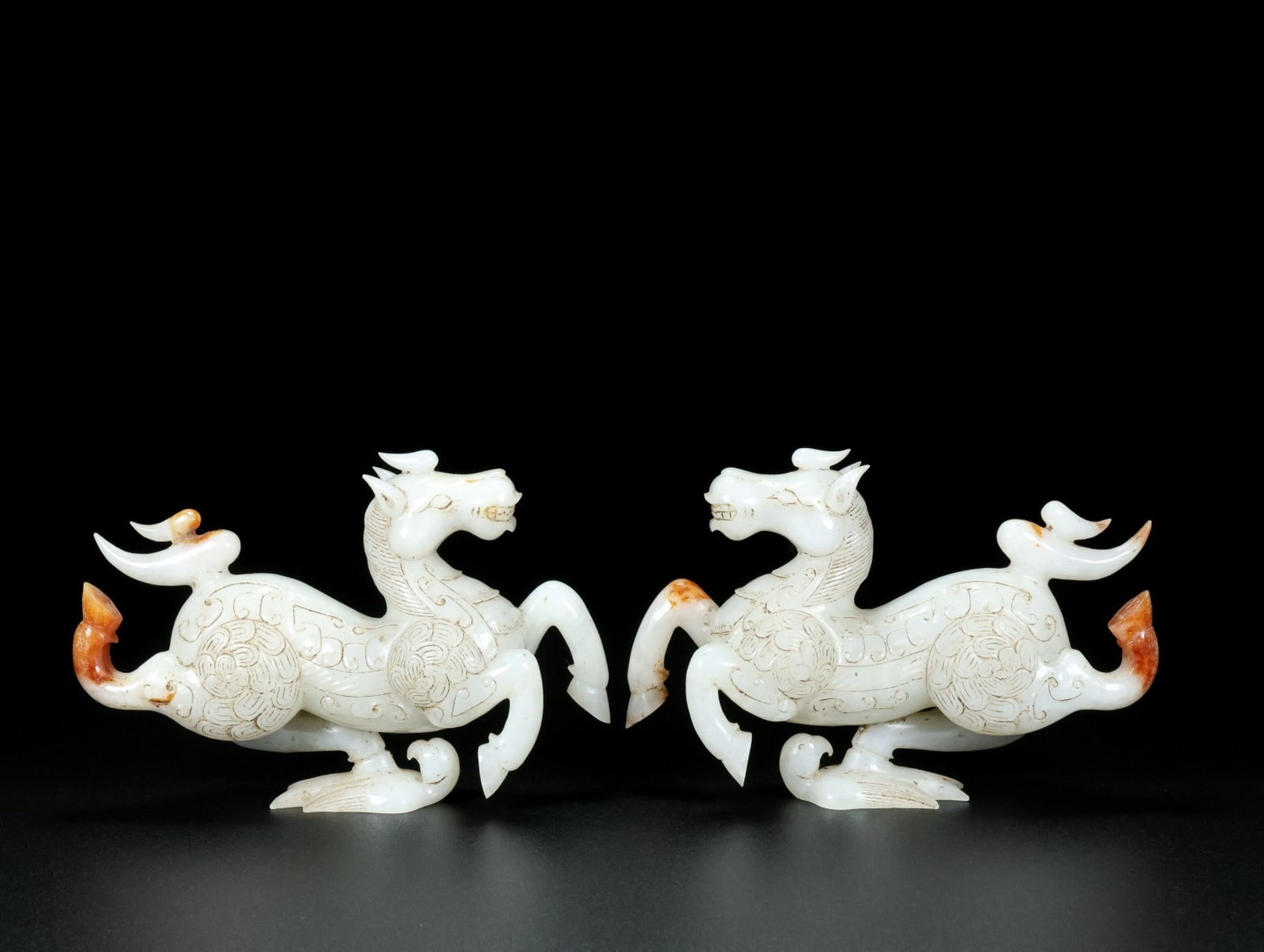 A Pair of Exquisite White Jade Horse Ornaments: A Pair of Exquisite White Jade Horse Ornaments,Qing Dynasty,China,Size:5.5inx3.7inx1.9in,Weight:669g 一对白玉骏马摆件,中国清代