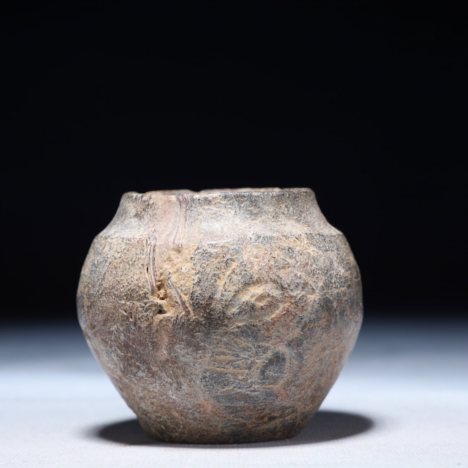 An Archaic Hongshan Culture Green Jade Jar: An Archaic Hongshan Culture Green Jade Jar,Ancient Time,China,Size:2.8inx2.4in,Weight:400g 红山文化青玉罐,中国新石器时
