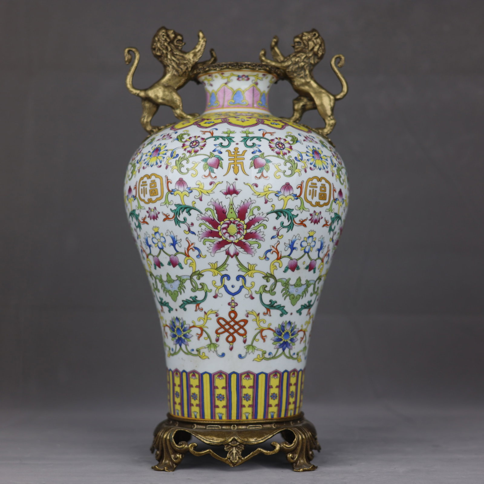 A Huge Famille-Rose Inlaid Bronze Lotus Pattern Lion-Ears Vase: A Huge Famille-Rose Inlaid Bronze Lotus Pattern Lion-Ears Vase,Qing Dynasty,China,Kangxi Six-character Mark,Size:17.3inx8.7in 粉彩镶铜缠枝莲纹狮&#