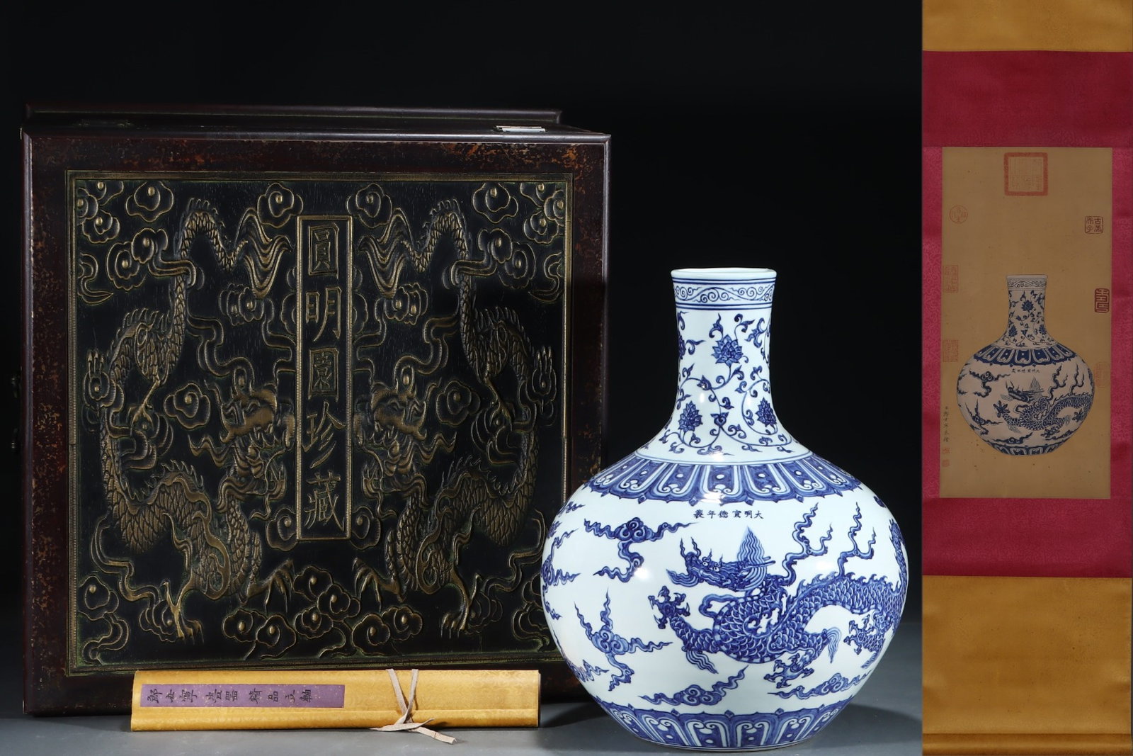 A Huge Blue and White Lotus and Dragon Pattern Vase,with Chinese Vertical Scroll Ink Painting on: A Huge Blue and White Lotus and Dragon Pattern Vase,with Chinese Vertical Scroll Ink Painting on Silk,Ming Dynasty,China,Xuande Six-character Mark,Size:(Without frame)24.2inx11.8in,(Porcelain)17.1inx1
