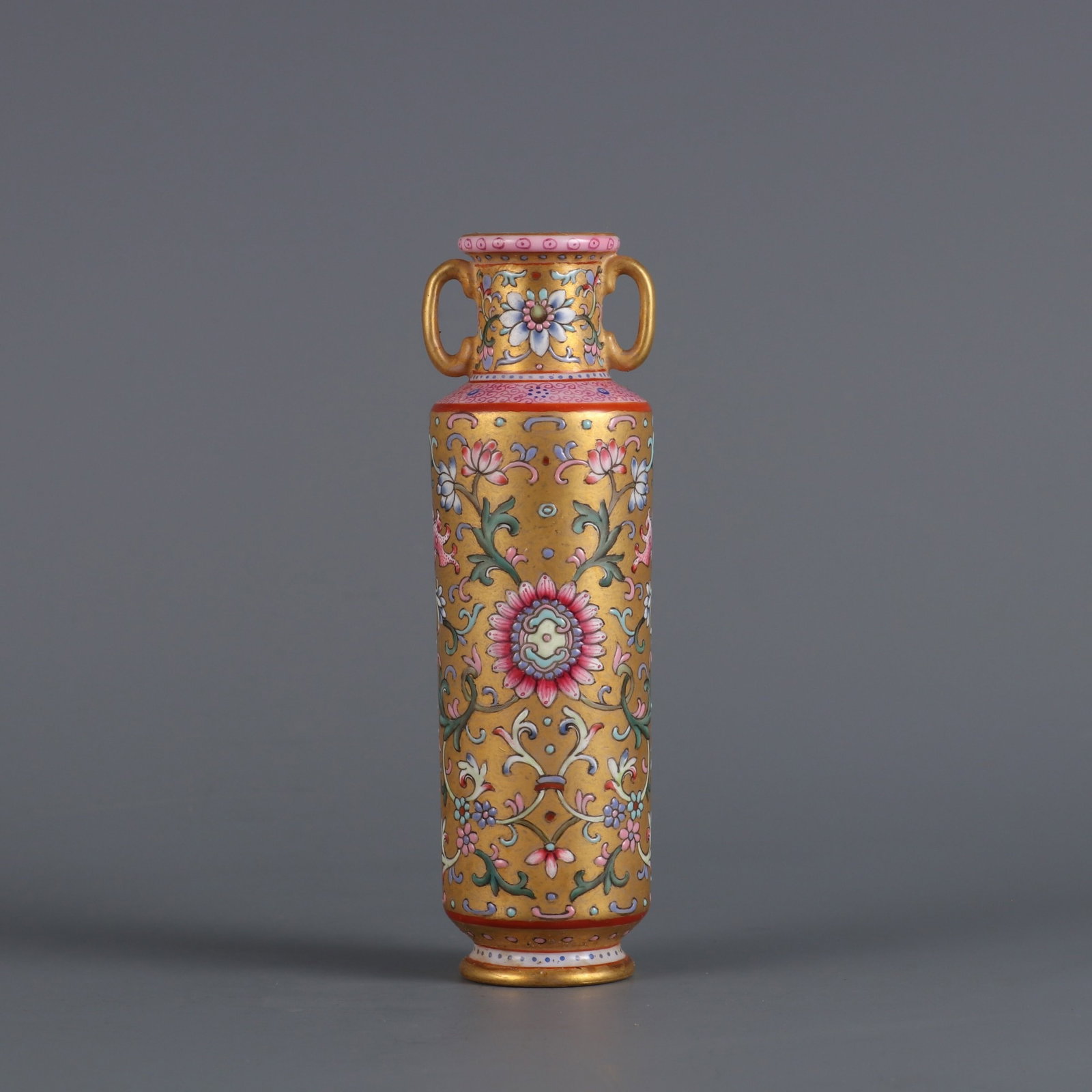 An Exquisite Gold Ground Famille-Rose Flower Pattern Double-Ears Vase: An Exquisite Gold Ground Famille-Rose Flower Pattern Double-Ears Vase,Qing Dynasty,China,Qianlong Six-character Mark,Size:5.1inx1.1in 金地粉彩花卉纹双&#