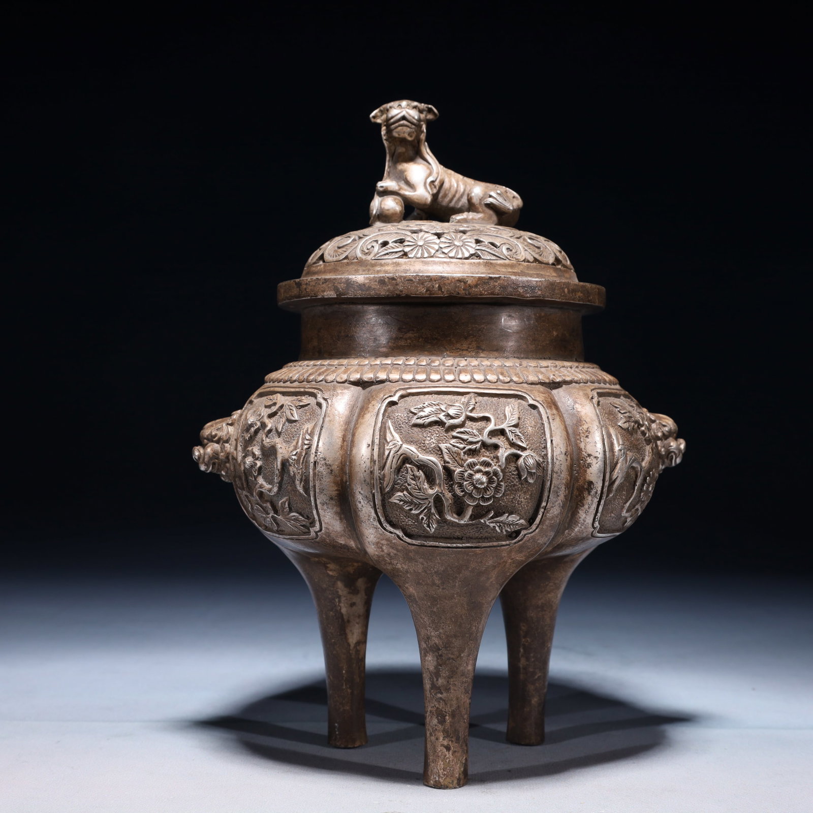An Exquisite Silver-plated Bronze Flower Pattern Beast-Ears Tripod Censer: An Exquisite Silver-plated Bronze Flower Pattern Beast-Ears Tripod Censer,Qing Dynasty,China,Size:7.5inx9.8in,Weight:2450g 铜镀银花卉纹兽耳三Ū