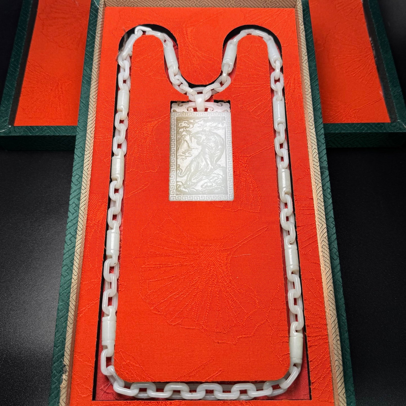 An Exquisite White Jade Tiger Patten Pendant: An Exquisite White Jade Tiger Patten Pendant,Qing Dynasty,China,Size:2.9inx1.6inx0.4in,Weight:126g 白玉虎纹牌,中国清代