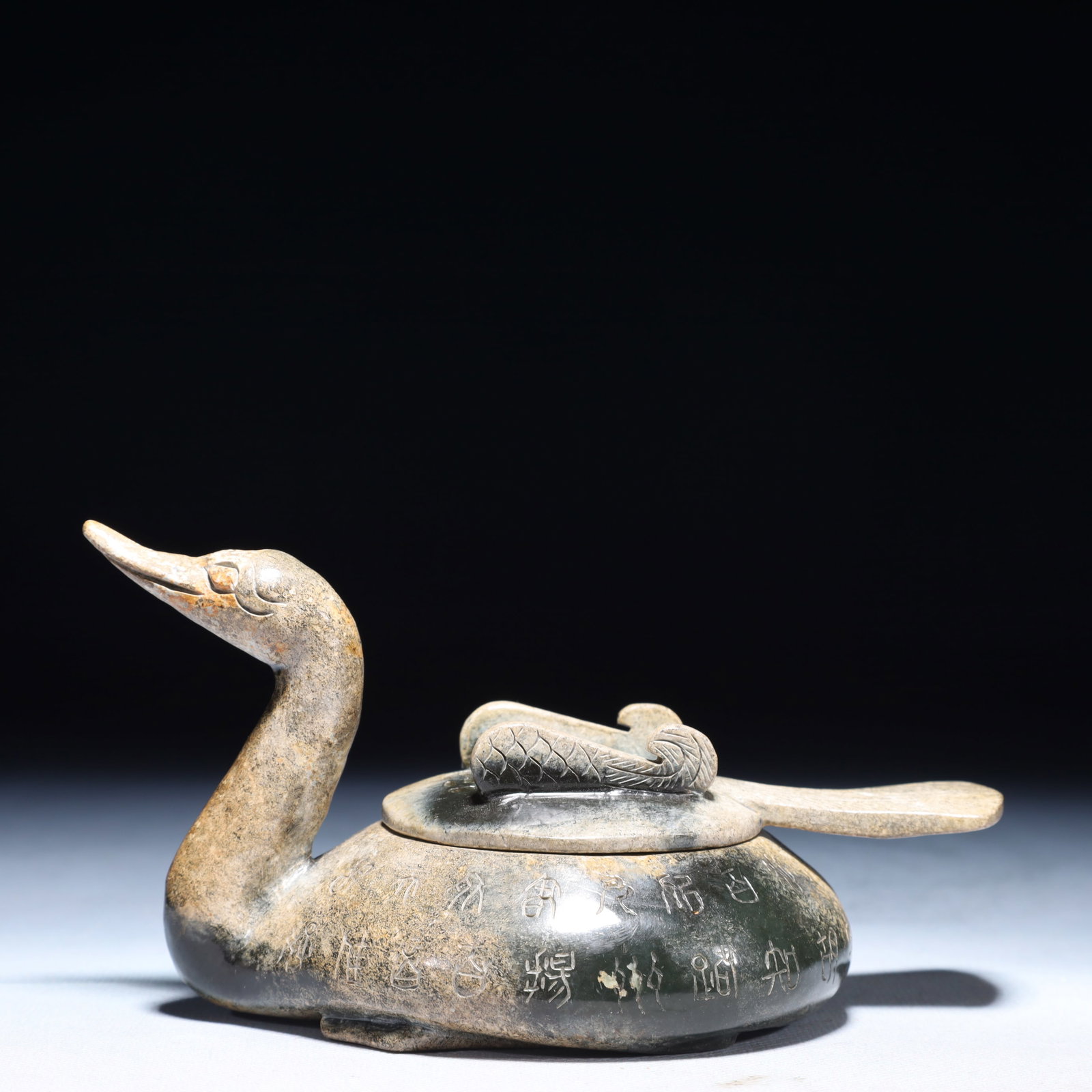 An Archaic Archaic Jade Goose Ornament,With Inscription: An Archaic Archaic Jade Goose Ornament,With Inscription,Ancient Time,China,Size:6.7inx3.9inx3.5in,Weight:550g 高古玉鹅摆件,带铭文,中国