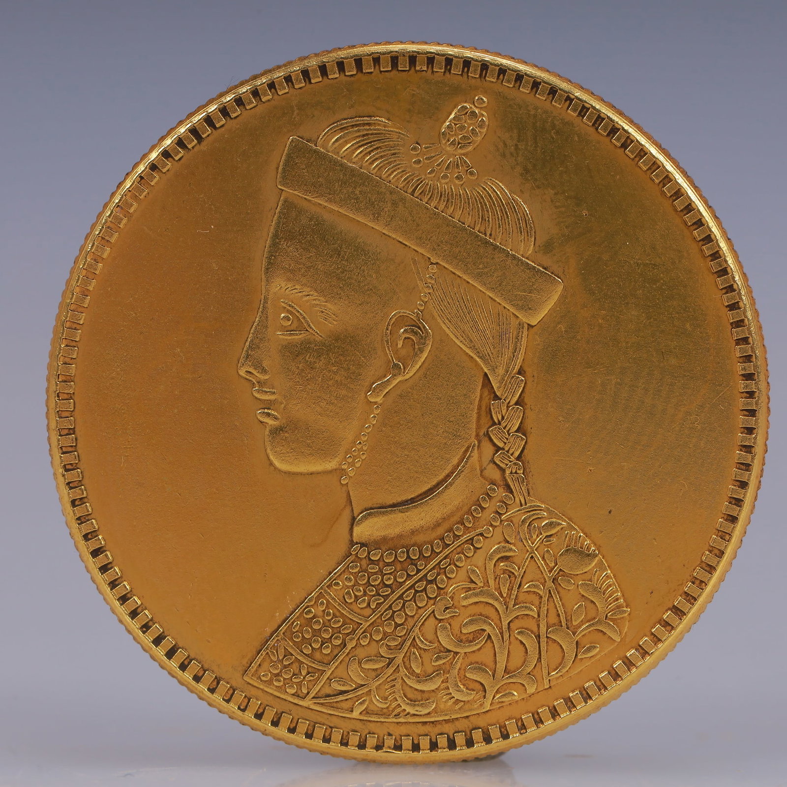An Exquisite Gilt Silver Coin: An Exquisite Gilt Silver Coin,Qing Dynasty, China, Size:1.5in Weight:37.5g
