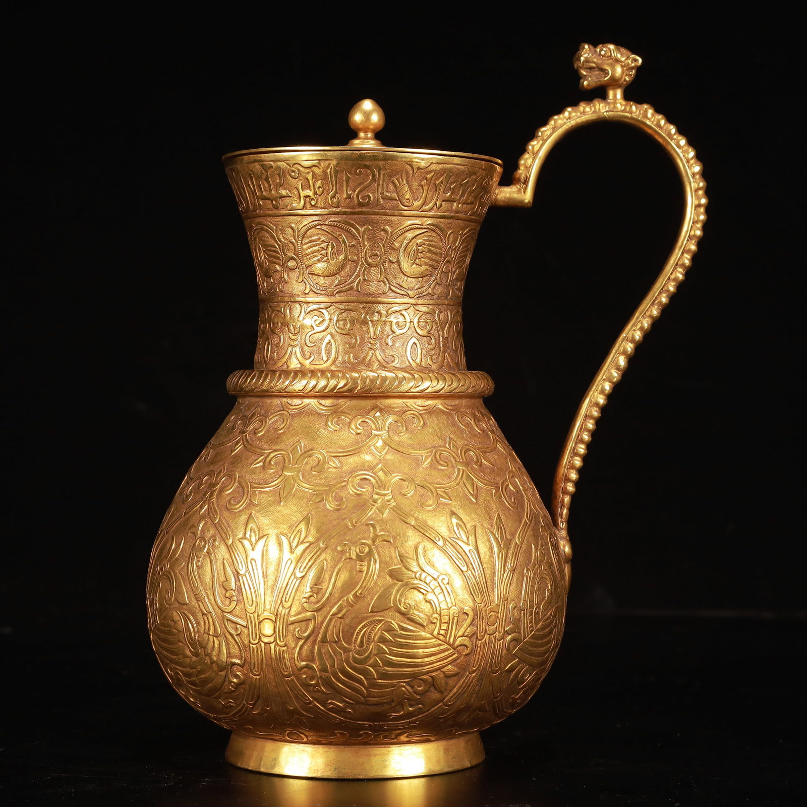 An Exquisite Gilt Bronze Auspicious Beast Pattern Ewer: An Exquisite Gilt Bronze Auspicious Beast Pattern Ewer,Qing Dynasty, China,Size:6.3inx5.1inx9.4in,Weight:1200g 铜鎏金瑞兽纹执壶,中国清