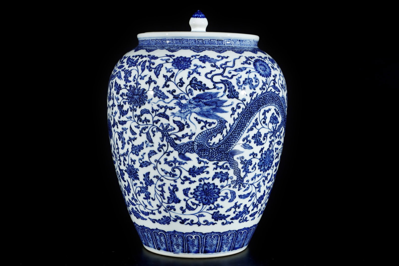 An Exquisite Blue and White Lotus and Dragon Pattern Jar with Cover: An Exquisite Blue and White Lotus and Dragon Pattern Jar with Cover,Qing Dynasty,China,Qianlong Six-character Mark,Size:14.2inx9.8in 青花缠枝莲龙纹盖