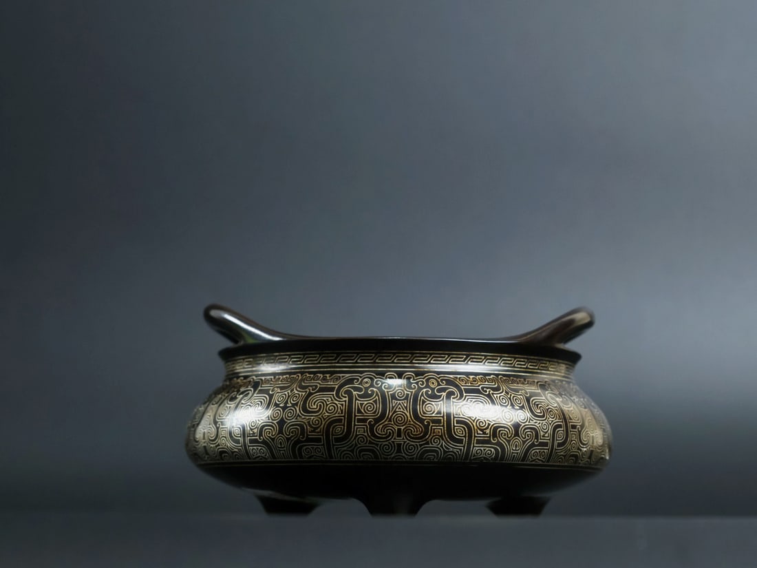 An Exquisite Bronze Inlaid Silver Dragon Pattern Double-Ears and Tripod Censer: An Exquisite Bronze Inlaid Silver Dragon Pattern Double-Ears and Tripod Censer,Qing Dynasty, China, With Mark,Size:2.2inx3.6in,Weight:755g 铜嵌银龙纹双耳Ç