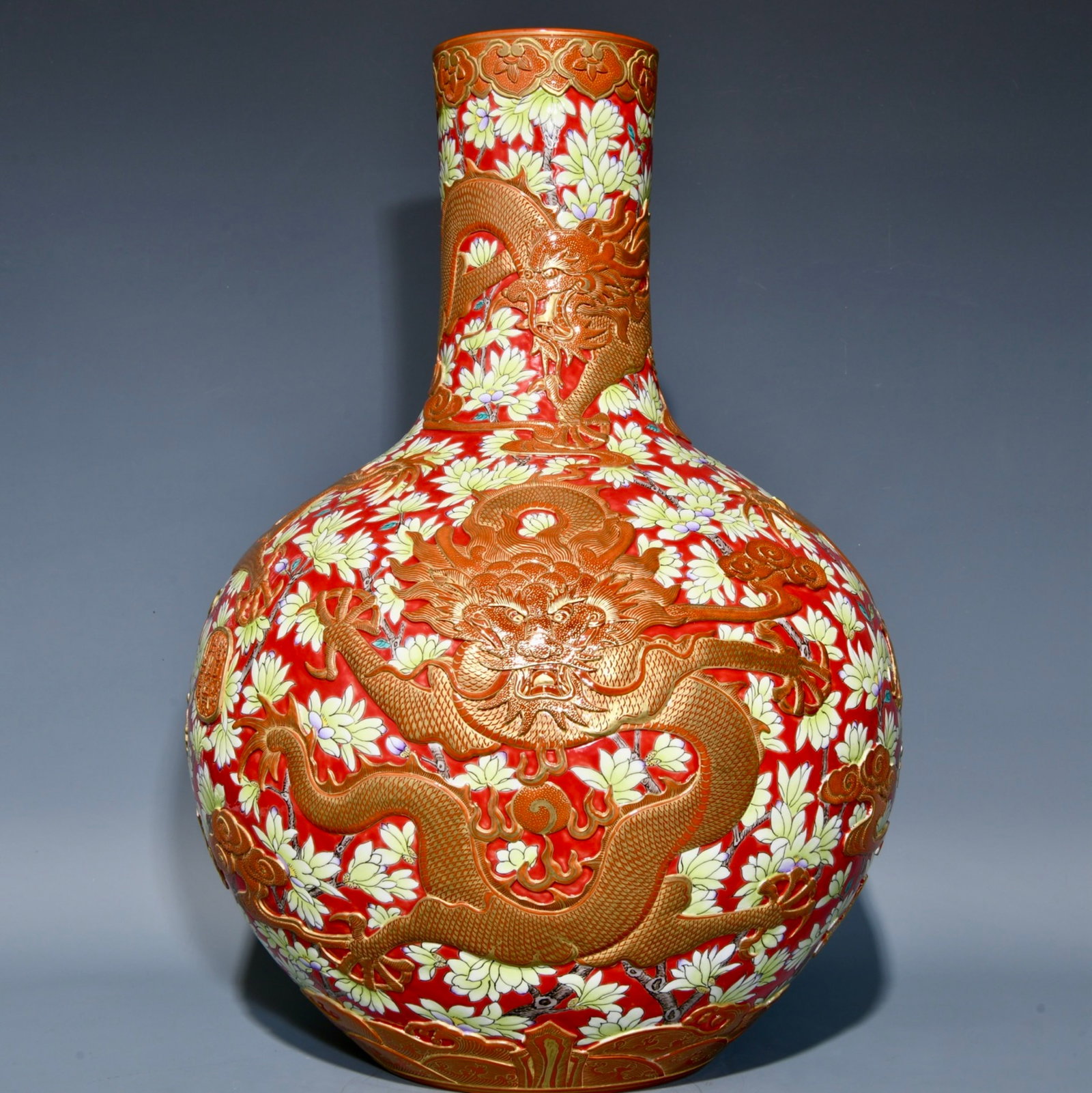 A Huge Red Ground Famille-Rose Flower and Dragon Pattern Vase: A Huge Red Ground Famille-Rose Flower and Dragon Pattern Vase,Qing Dynasty,China,Qianlong Six-character Mark,Size:18.5inx13in 红地粉彩花卉龙纹瓶,&