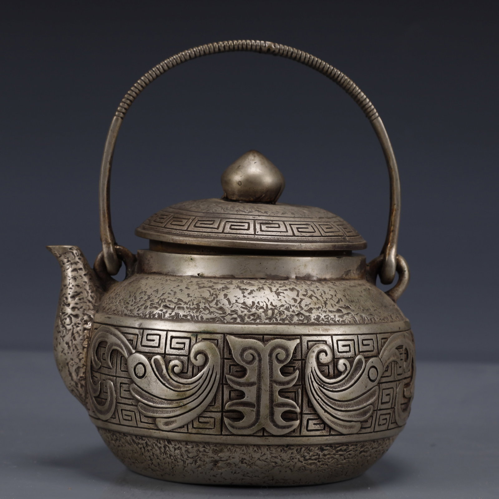 An Exquisite Silver-Plated Bronze Ewer: An Exquisite Silver-Plated Bronze Ewer,The Republic of China,Size:5.9inx5.1inx6.7in,Weight:950g 铜镀银执壶,中国民国时期,