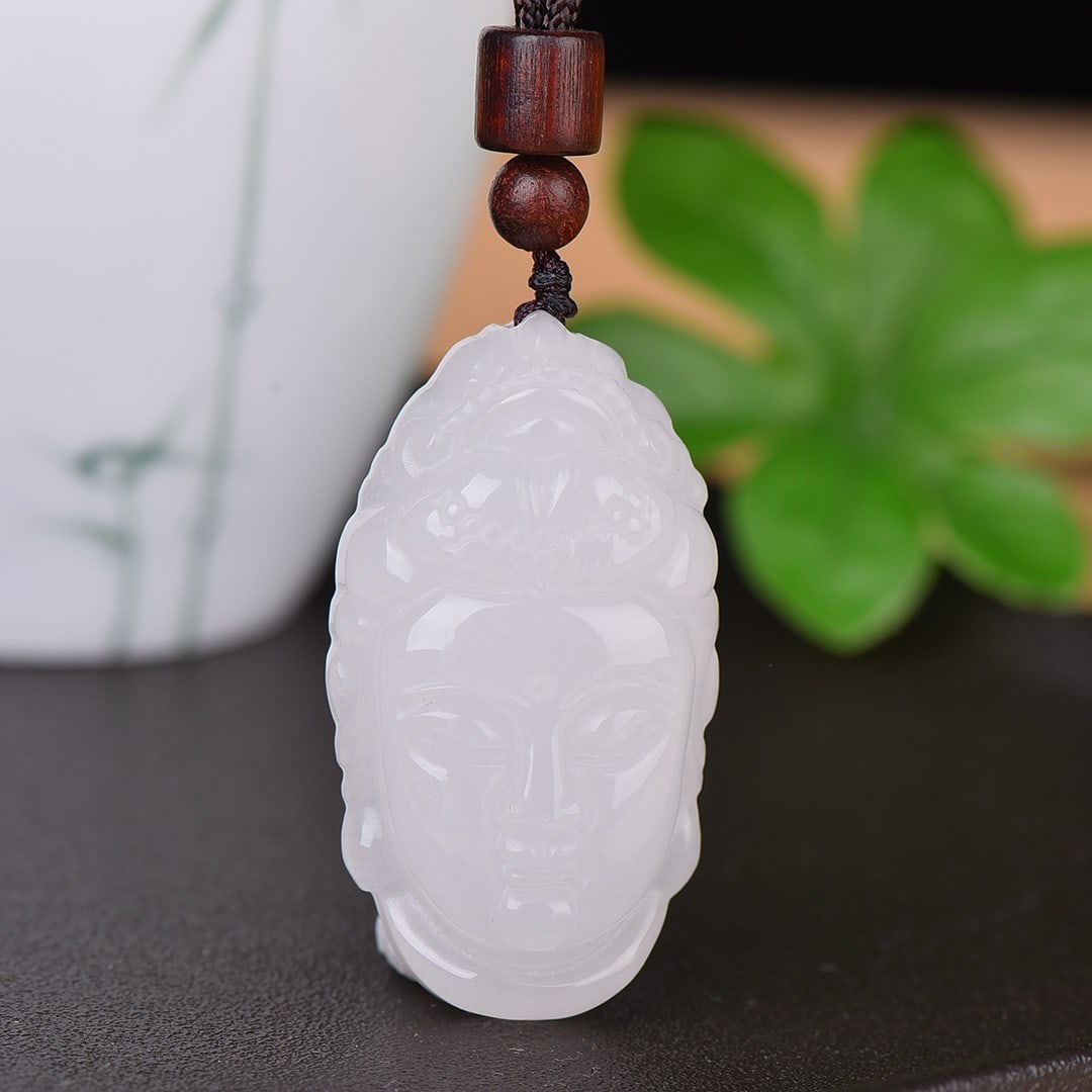 An Exquisite White Jade Buddha Statue Pendant: An Exquisite White Jade Buddha Statue Pendant,Size:1inx1.8in 白玉佛像挂件