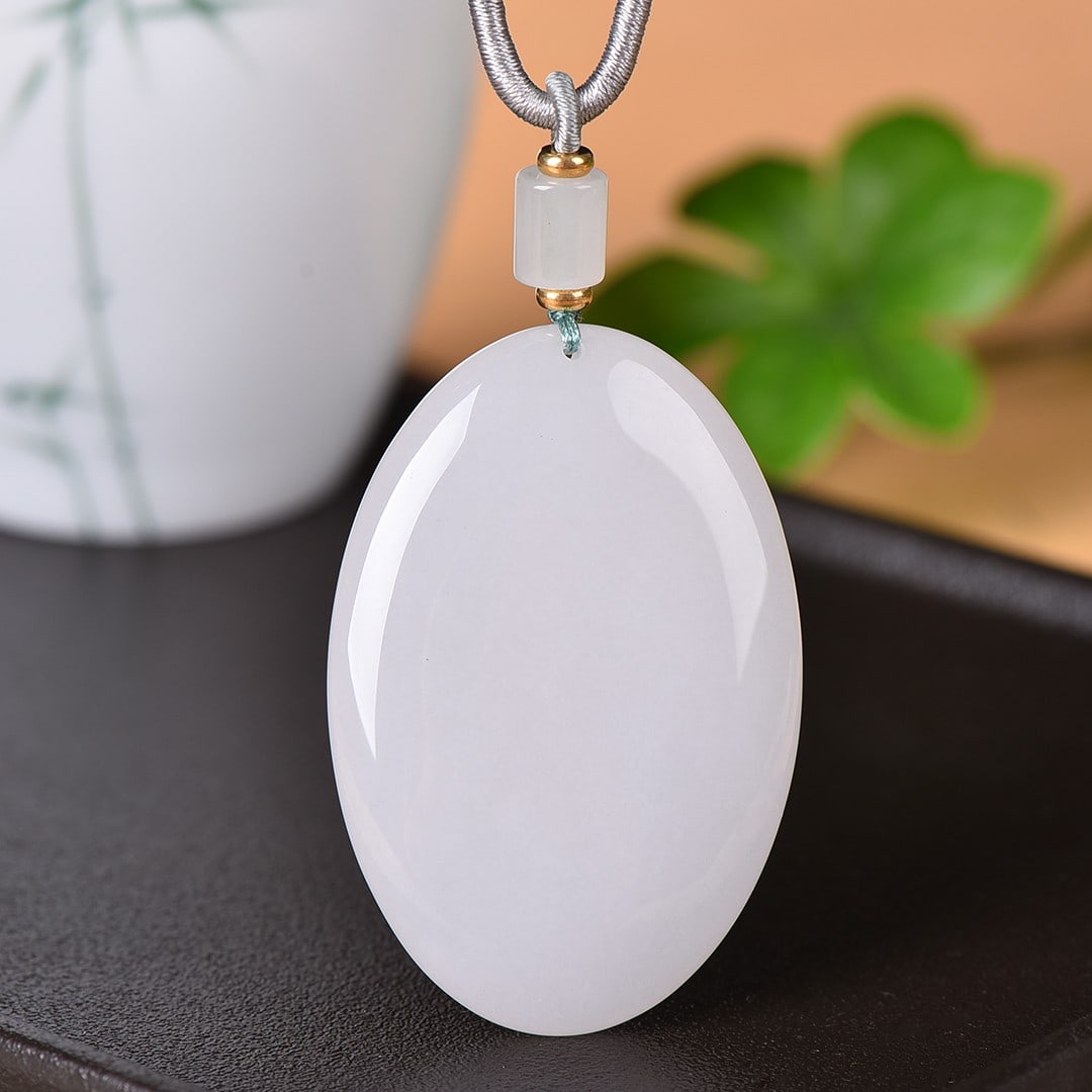 An Exquisite White Jade Pendant: An Exquisite White Jade Pendant,Size:1.6inx2.4in 白玉挂件