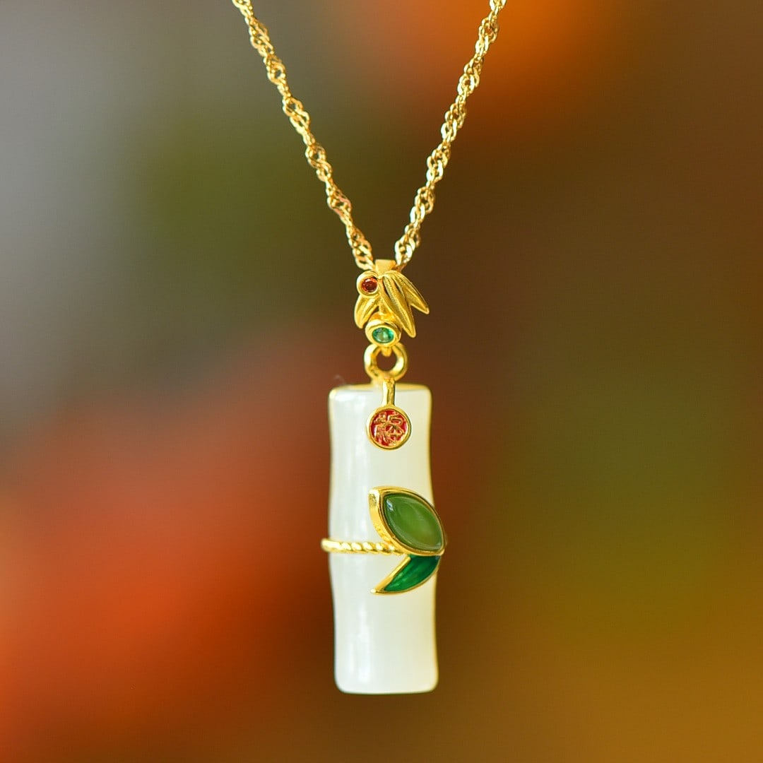 An Exquisite Sterling Silver-Gold Plated Inlaid White Jade Pendant: An Exquisite Sterling Silver-Gold Plated Inlaid White Jade Pendant 纯银镀金镶白玉吊坠