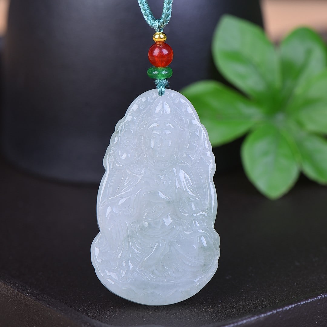 An Exquisite Jadeite Statue of Avalokitesvara Pendant: An Exquisite Jadeite Statue of Avalokitesvara Pendant,Size:1.2inx2in 翡翠观音挂件
