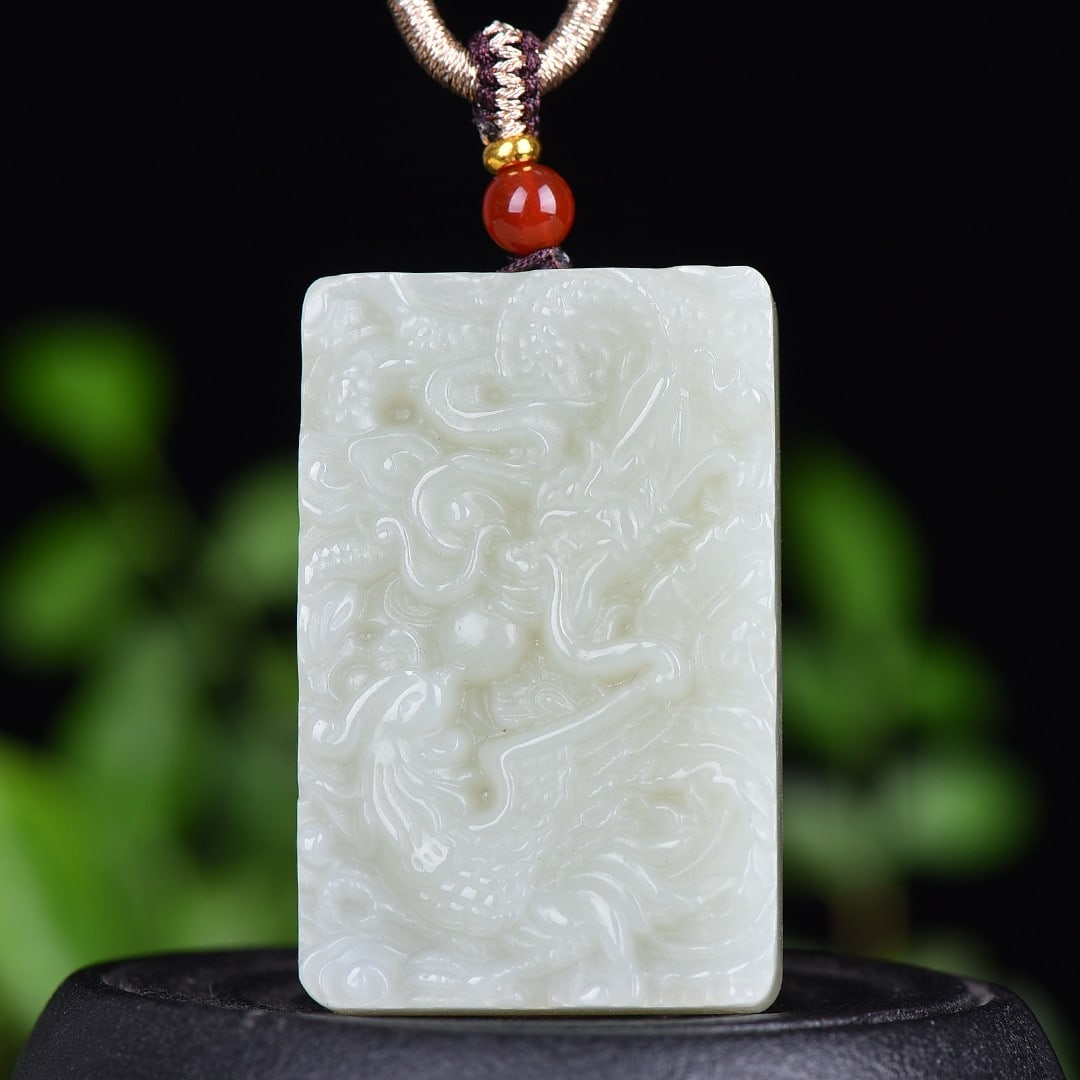 An Exquisite White Jade Dragon and Phoenix Pattern Pendant (1 of 4)