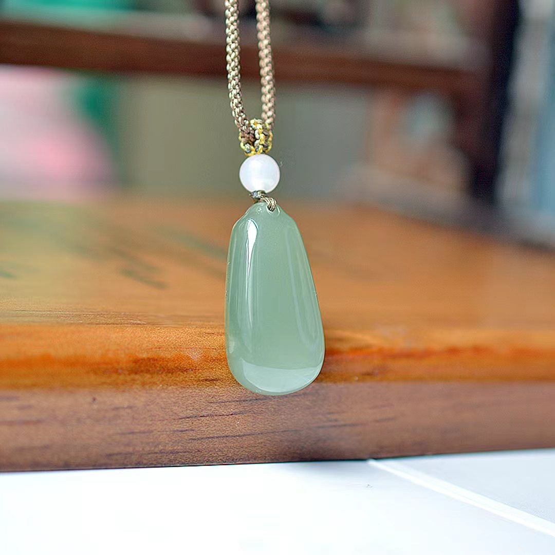 An Exquisite Greenish Jade Pendant: An Exquisite Greenish Jade Pendant,Size:0.6inx1.2in 青玉挂件