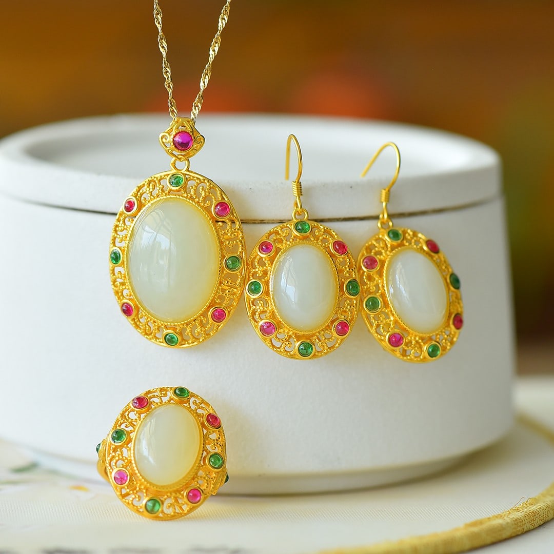 A Set of Fine Sterling Silver-Gold Plated Inlaid White Jade Jewelrys: A Set of Fine Sterling Silver-Gold Plated Inlaid White Jade Jewelrys 一套纯银镀金镶白玉首饰