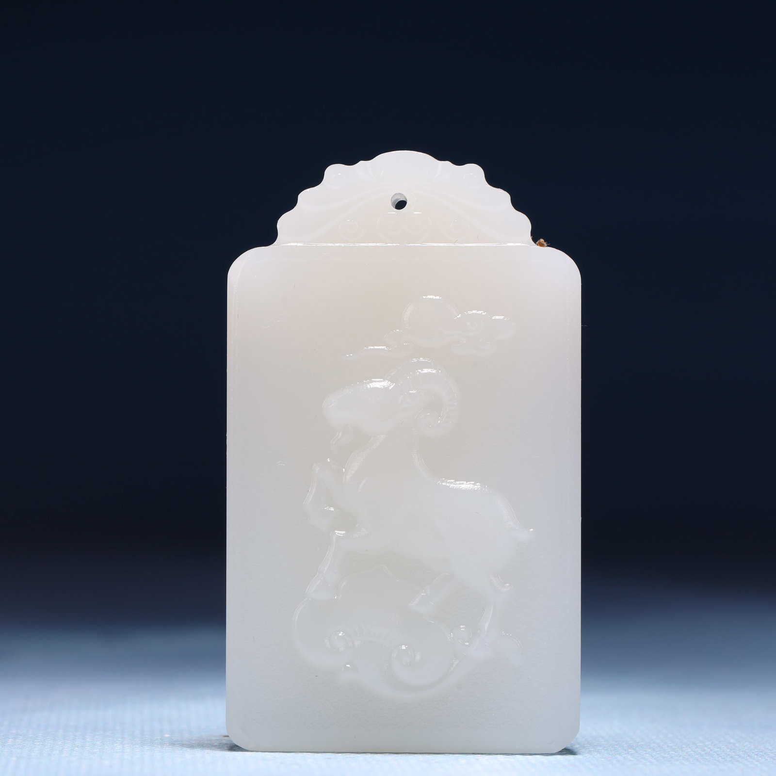 An Exquisite White Jade Sheep Pattern Pendant: An Exquisite White Jade Sheep Pattern Pendant,Size:1.4inx0.4inx2.4in,Weight:45g 白玉羊纹牌