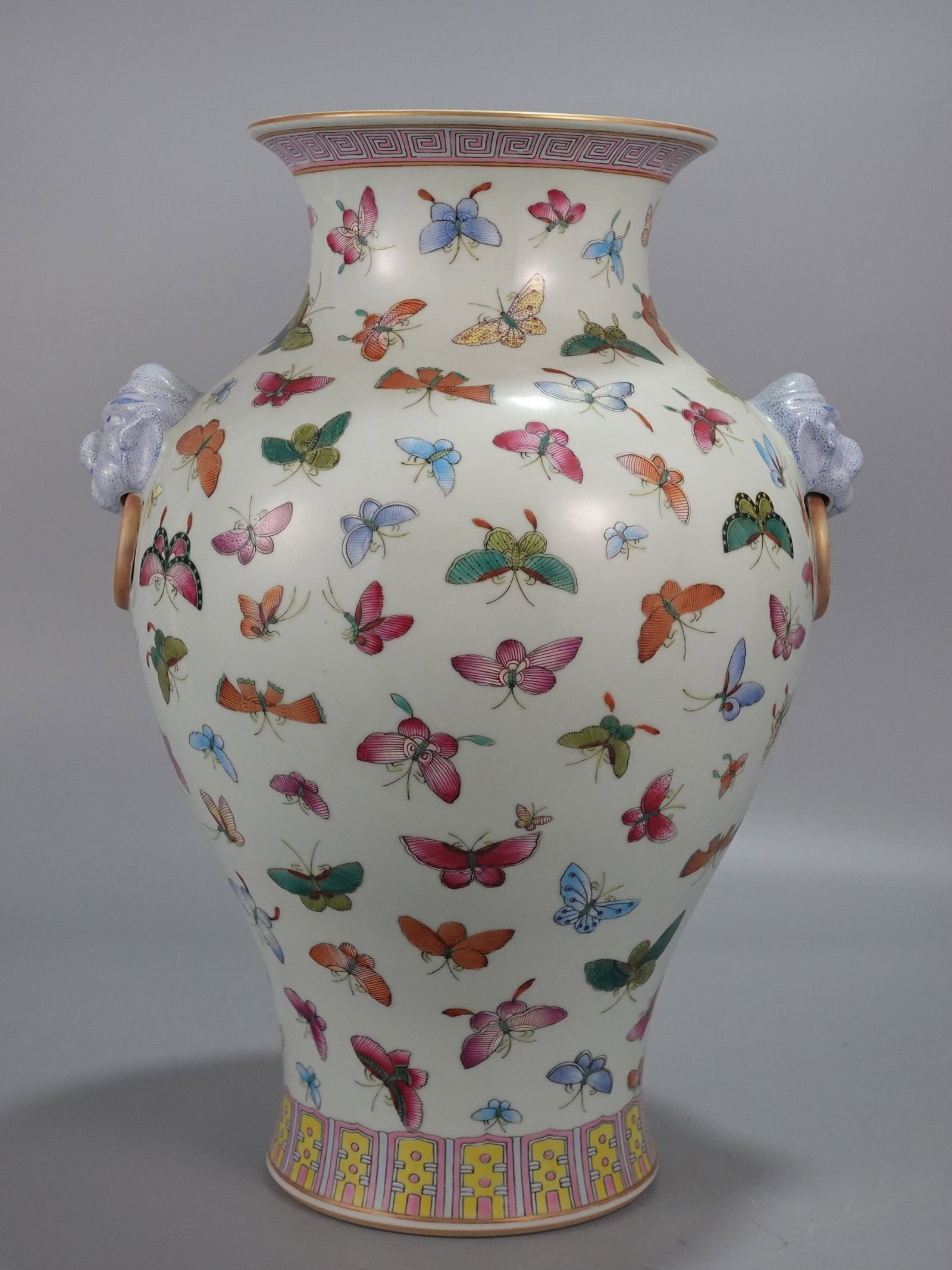 A Huge Famille-Rose Butterfly Pattern Beast-Ears Vase: A Huge Famille-Rose Butterfly Pattern Beast-Ears Vase,Qing Dynasty,China,Qianlong Six-character Mark,Size:15.7inx11.4in 粉彩蝴蝶纹兽耳瓶,中国