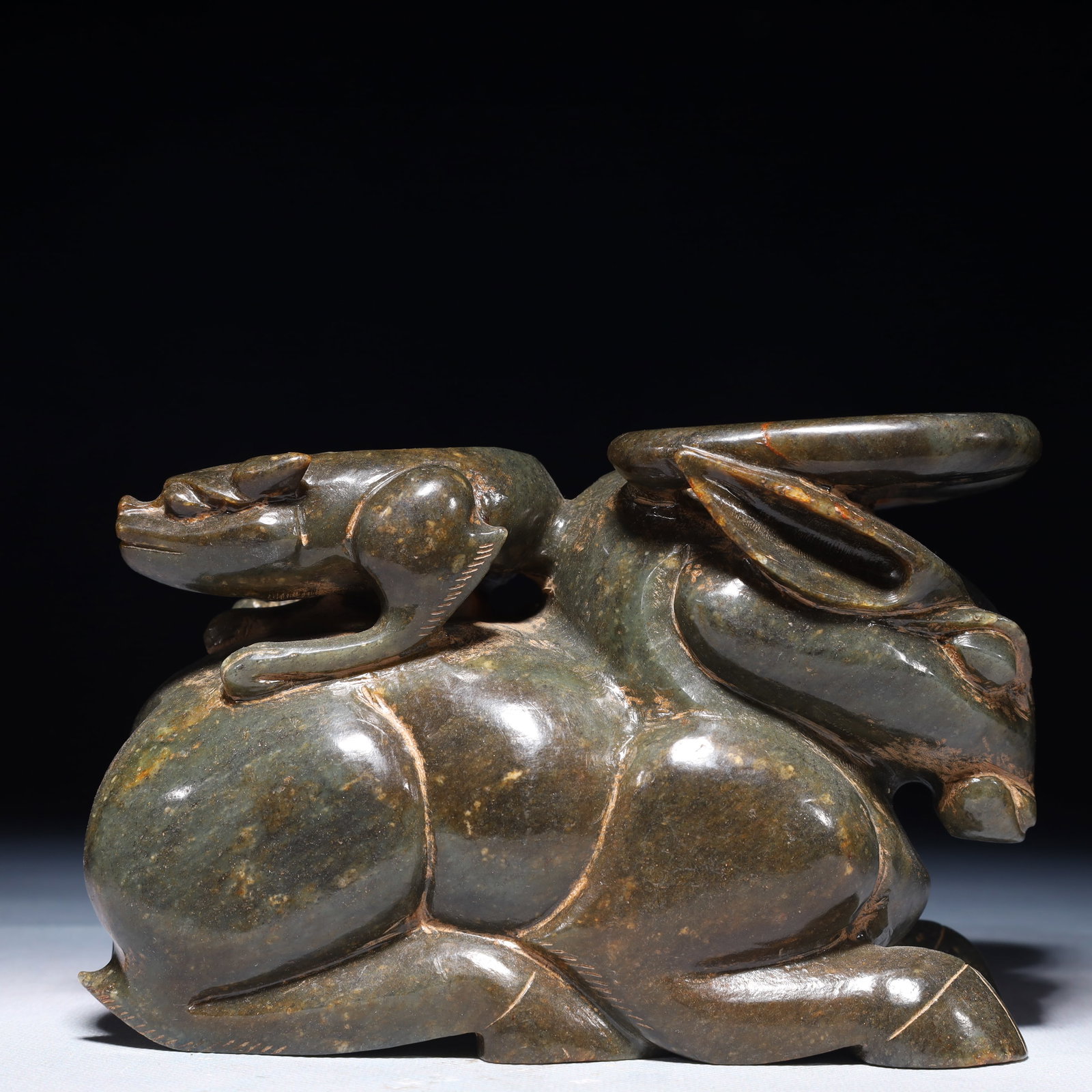 An Exquisite Jasper Beast Ornament: An Exquisite Jasper Beast Ornament,Qing Dynasty,China,Size:6.7inx3.3inx4.3in,Weight:2700g 碧玉兽摆件,中国清代