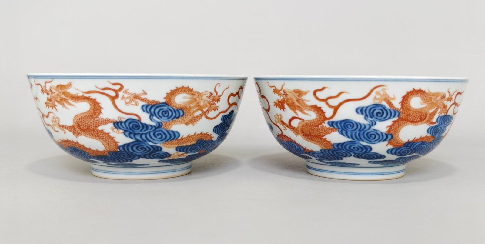 A Pair of Exquisite Blue and White Iron-Red Auspicious Cloud and Dragon Pattern Bowls (1 of 9)