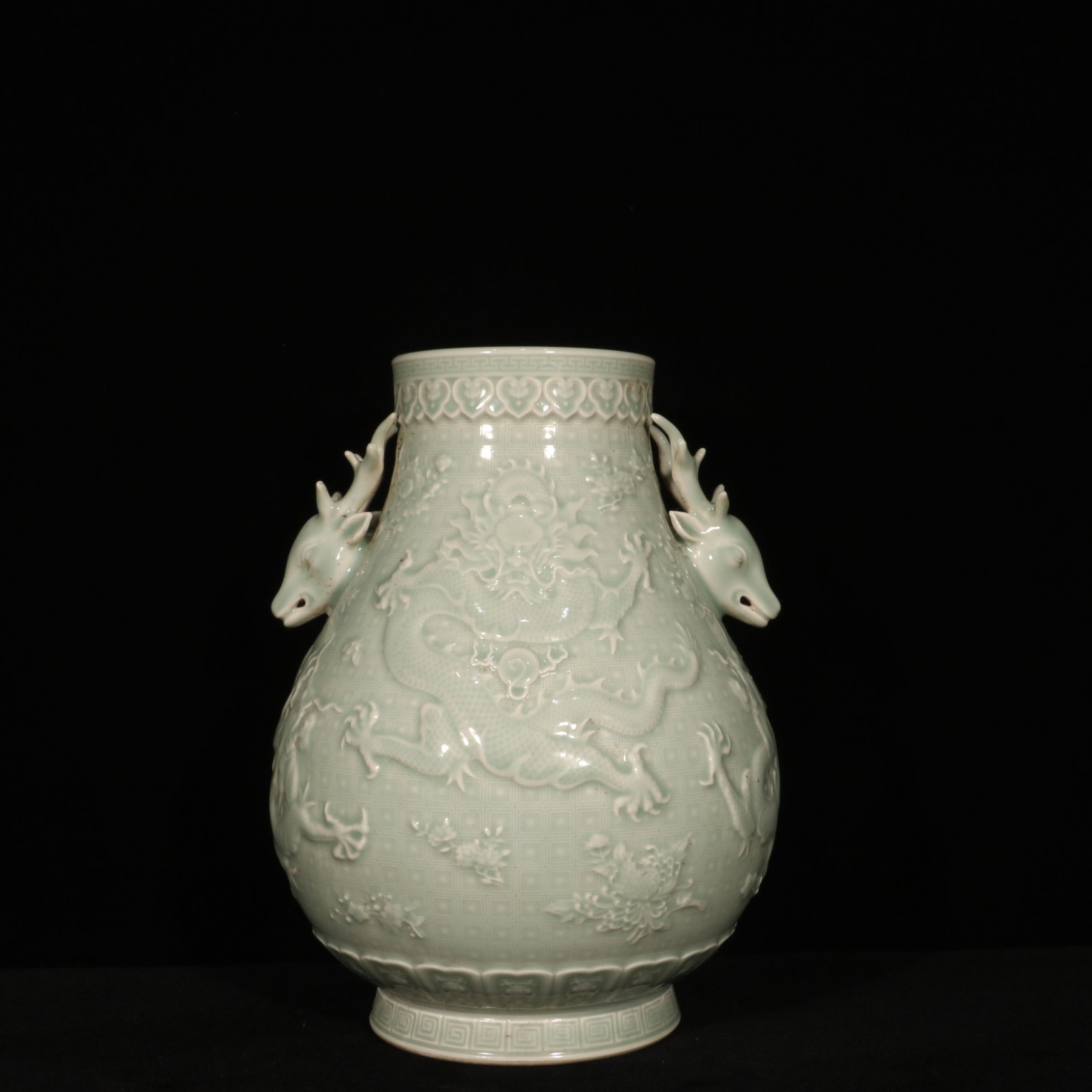 An Exquisite Celadon Glazed Flower and Dragon Pattern Deer-Ears Vase (1 of 9)