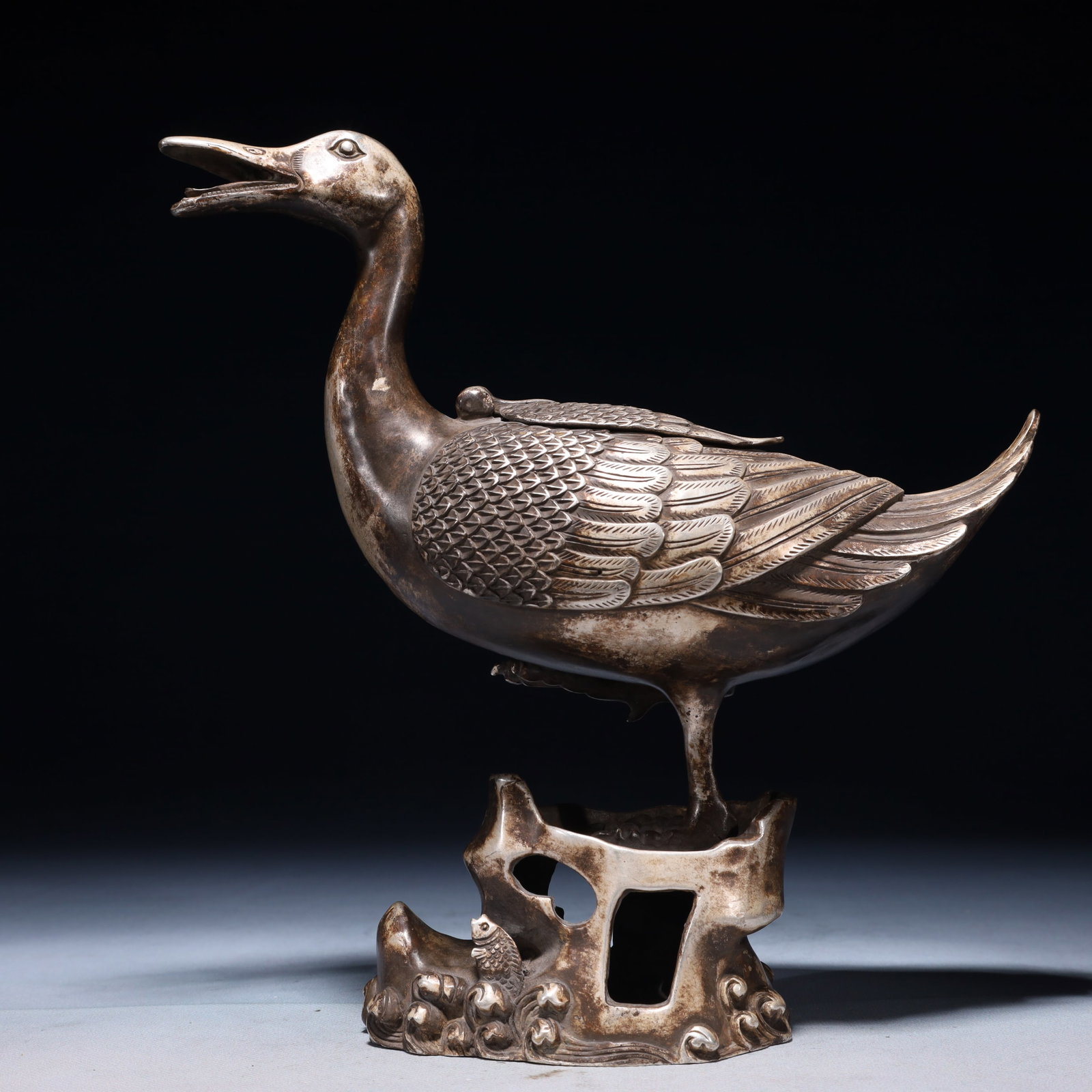 An Exquisite Silver-plated Bronze Duck Censer: An Exquisite Silver-plated Bronze Duck Censer,Qing Dynasty,China,Qianlong Four-character Mark,Size:9.1inx3.5inx10.2in,Weight:1200g 铜镀银鸭香炉,中国