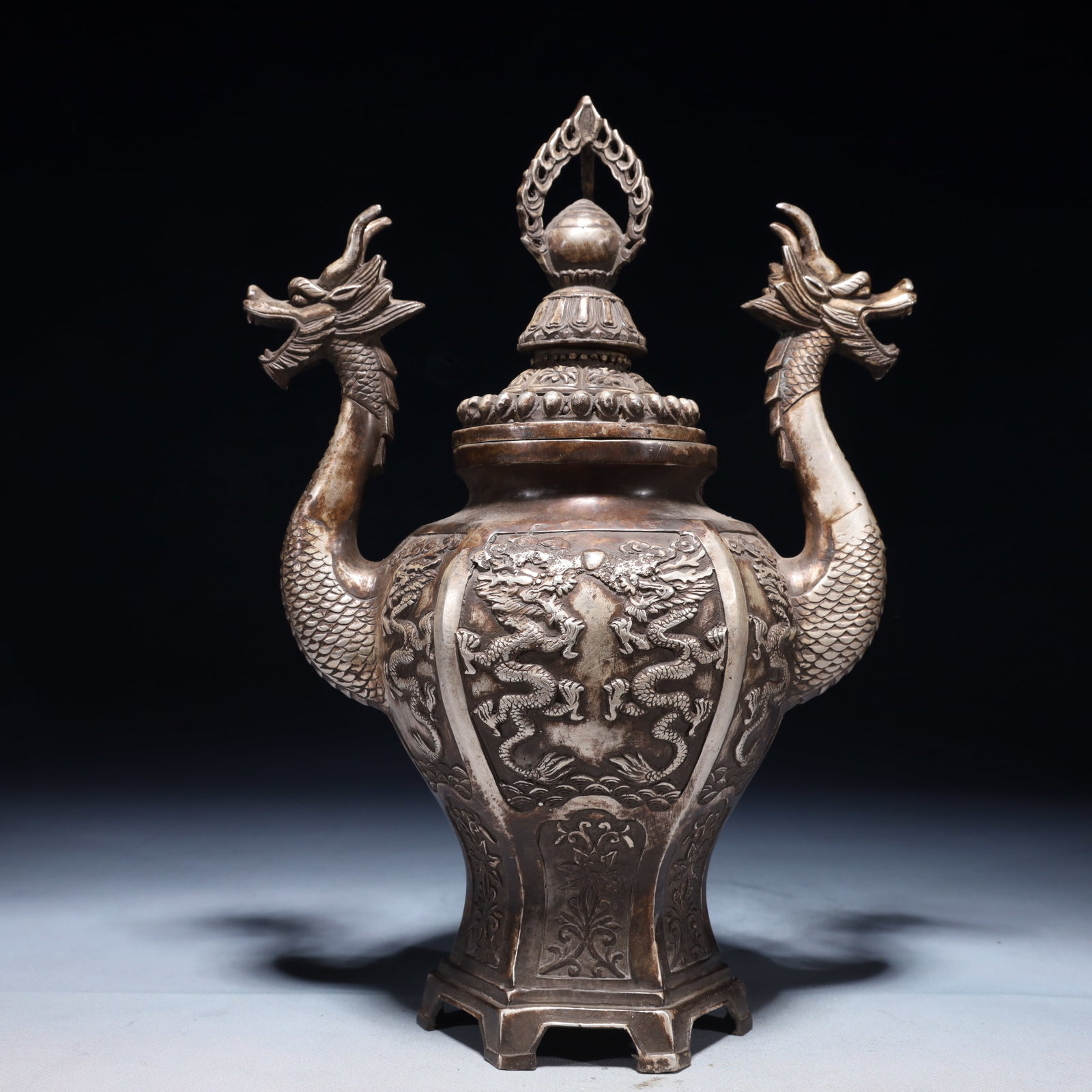 An Exquisite Silver-plated Bronze Flower and Dragon Pattern Double-Ears Censer: An Exquisite Silver-plated Bronze Flower and Dragon Pattern Double-Ears Censer,Ming Dynasty,China,Zhengde Four-character Mark,Size:8.7inx4.7inx12.2in,Weight:1800g