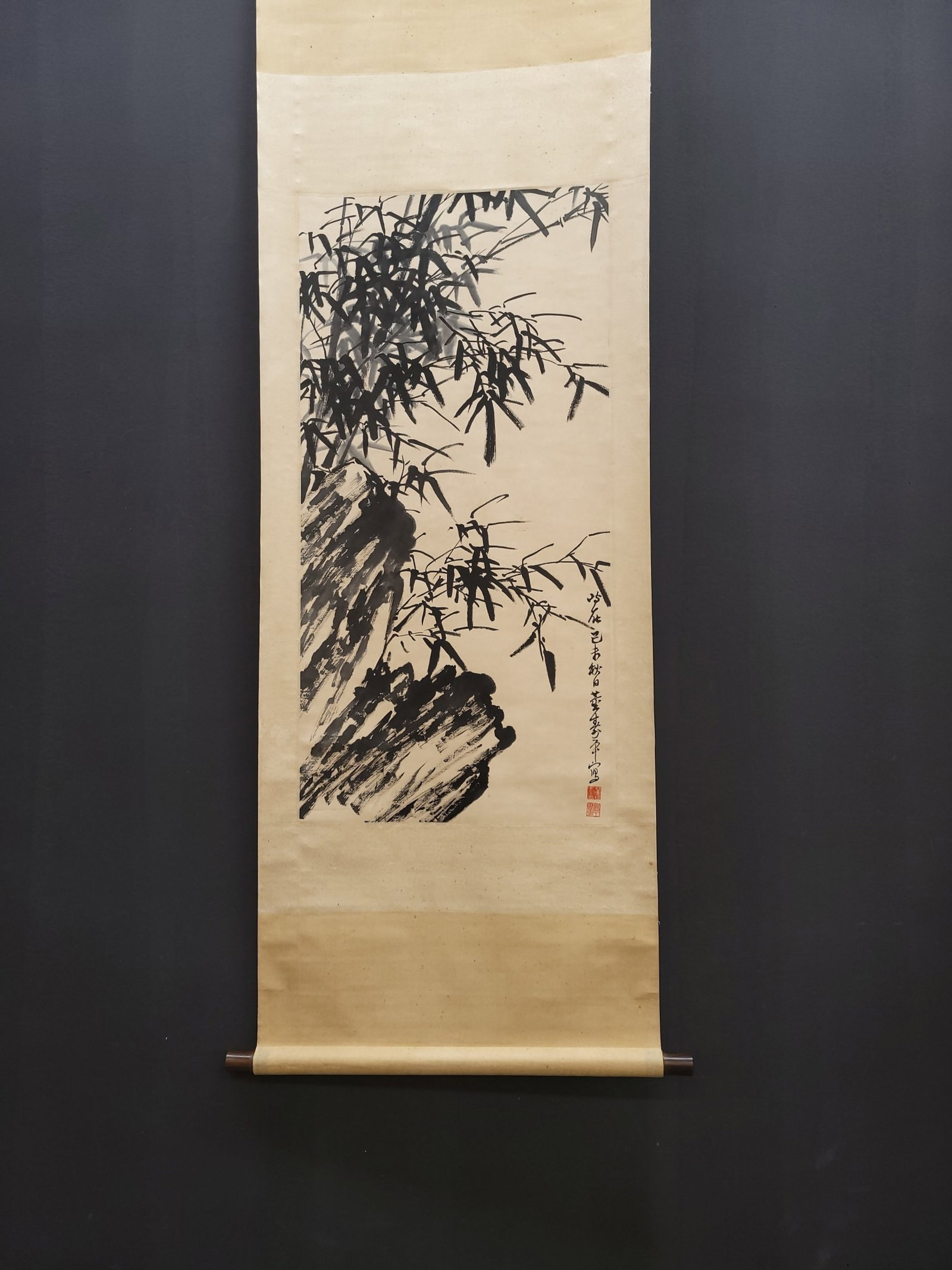 A Chinese Vertical Scroll Ink Painting of Bamboo on Paper: A Chinese Vertical Scroll Ink Painting of Bamboo on Paper,Dong Shouping,Size:19.1inx38.8in 一幅中国水墨竹子画立轴,董寿