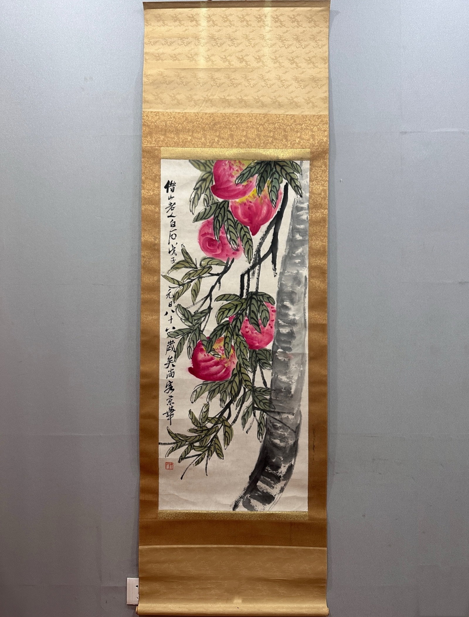 A Chinese Vertical Scroll Ink Painting of Peach on Paper: A Chinese Vertical Scroll Ink Painting of Peach on Paper,Qi Baishi,Size:19.7inx45.7in 一幅中国水墨桃子画立轴,齐白石