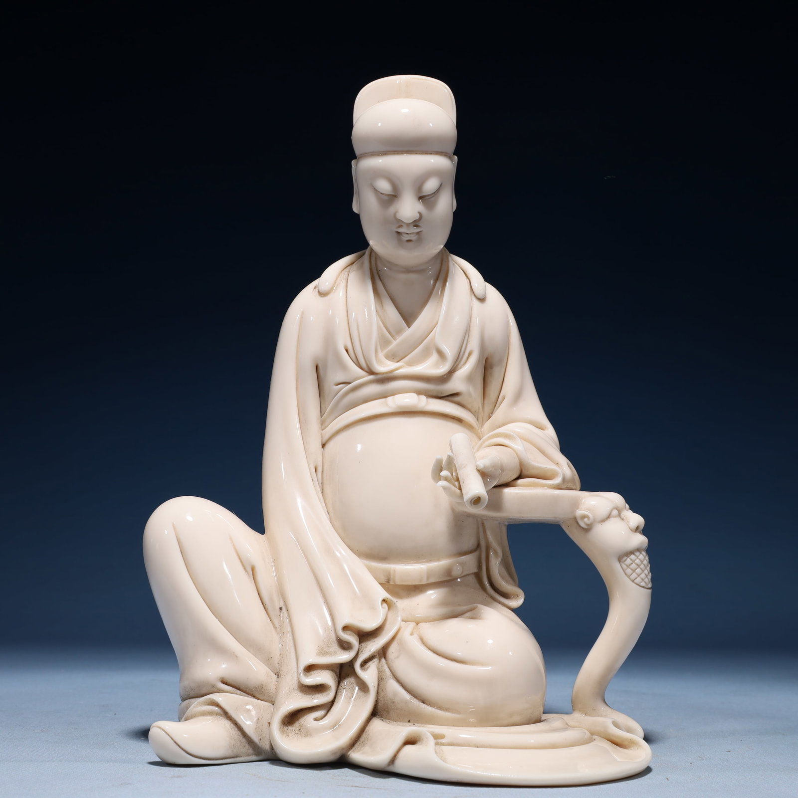 A Solemn Blance-De-Chine Statue of Figure: A Solemn Blance-De-Chine Statue of Figure Blance-De-Chine Statue of Figure,Ming Dynasty,China,He Chaozong Mark,Size:7.9inx5.5inx10.6in,Weight:1900g 德化瓷人物像,