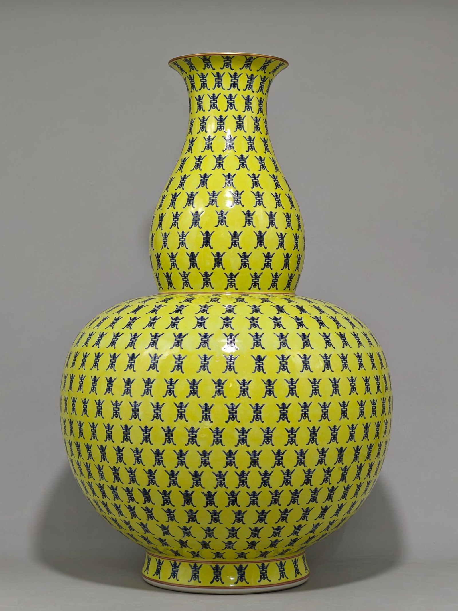 A Huge Yellow Ground Shou-Character Pattern Gourd-Shaped Vase: A Huge Yellow Ground Shou-Character Pattern Gourd-Shaped Vase,Qing Dynasty,China,Tongzhi Four-character Mark,Size:23inx15in 黄地寿字纹葫芦瓶中