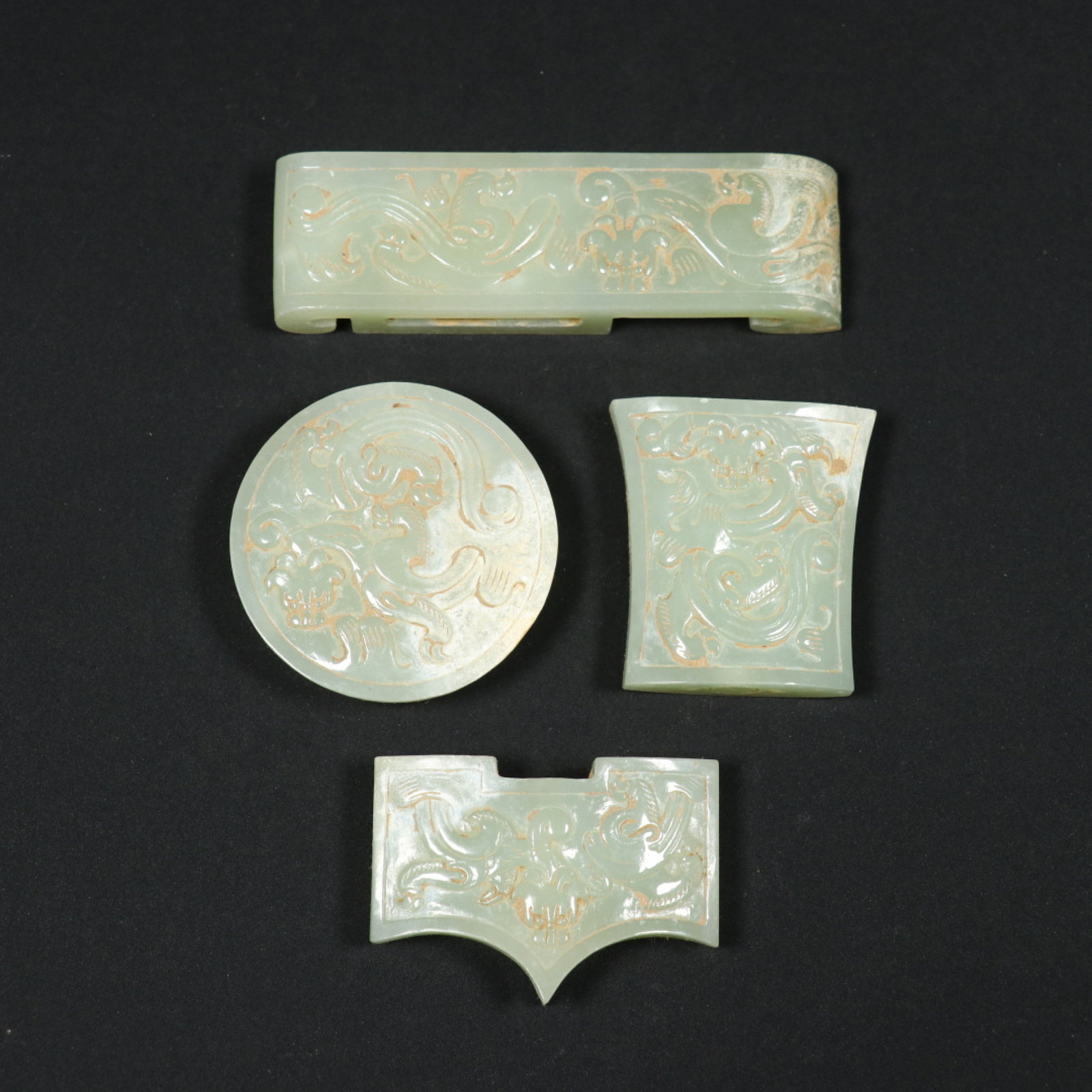 A Set of Fine White Jade Dragon Pattern Ornaments: A Set of Fine White Jade Dragon Pattern Ornaments,Han Dynasty,China,Size:1.9inx0.5in,3.6inx1inx0.5in,1.7inx1.6inx0.5in,2inx1.4inx0.5in,Weight:212.3g 一套白玉龙纹