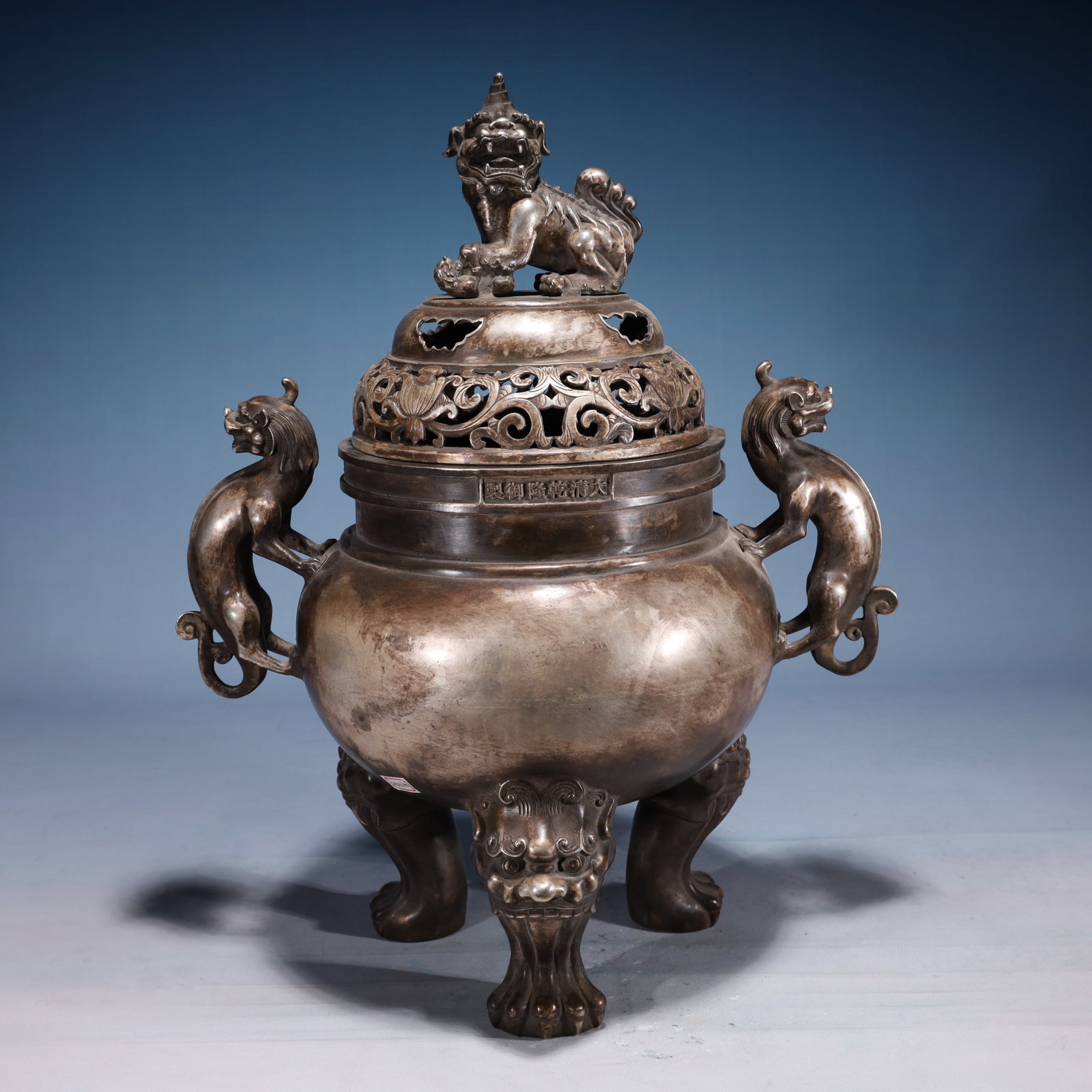 An Exquisite Silver-plated Bronze Lotus Pattern Double-Ears and Tripod Censer: An Exquisite Silver-plated Bronze Lotus Pattern Double-Ears and Tripod Censer,Qing Dynasty,China,Size:15inx10.2inx19.7in,Weight:8100g 铜镀银缠枝莲纹双&#