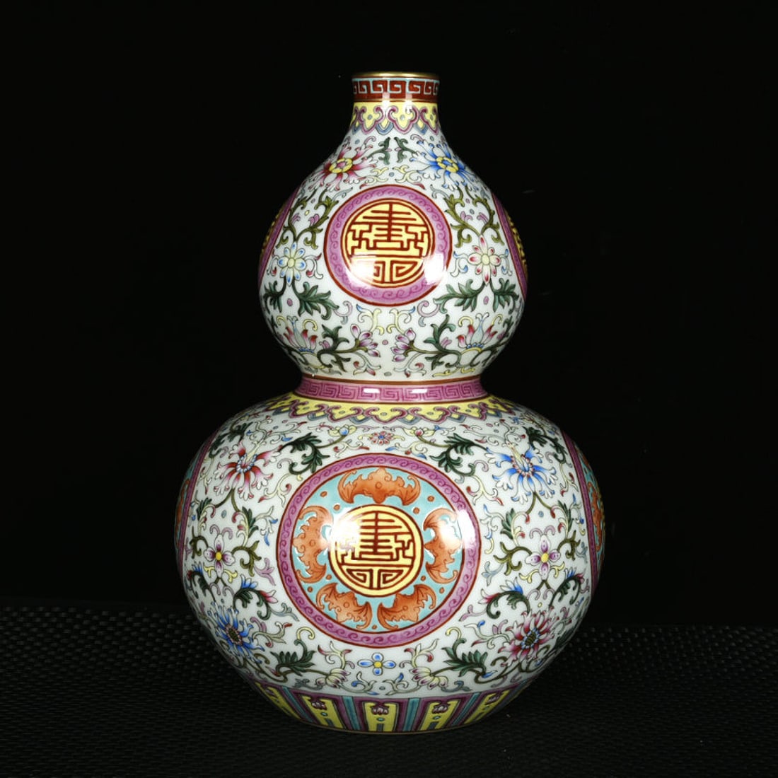 An Exquisite Enamel Painted Gold Bats and Peach Pattern Gourd-Shaped Vase: An Exquisite Enamel Painted Gold Bats and Peach Pattern Gourd-Shaped Vase,Qing Dynasty,China,Qianlong Six-character Mark,Size:11.4inx7.9in