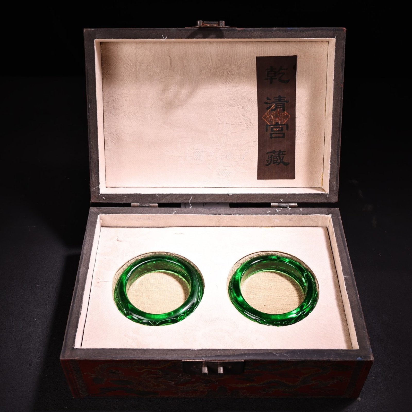 A Pair of Rare Emerald Bracelets: A Pair of Rare Emerald Bracelets,Qing Dynasty, China,Size:(Inside Diameter)2.4in,Weight:240g 一对祖母绿宝石手镯,中国清代