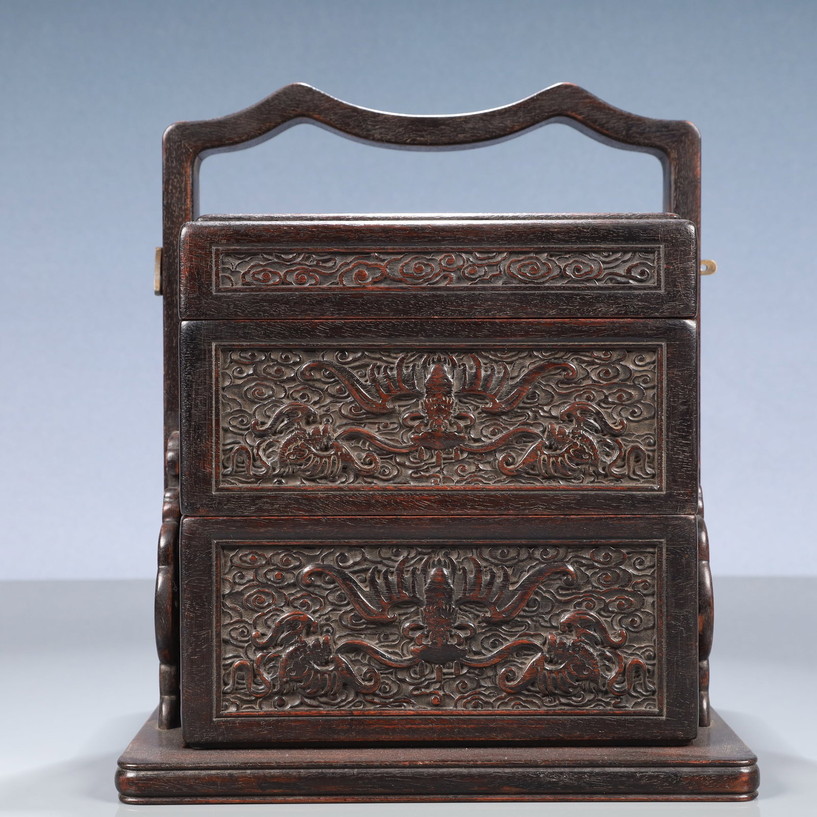 An Exquisite Zitanwood Auspicious Cloud and Dragon Pattern Tiered box: An Exquisite Zitanwood Auspicious Cloud and Dragon Pattern Tiered box,Qing Dynasty, China,Size:8.7inx7.5inx10.6in,Weight:1800g 紫檀木祥云龙纹提盒,