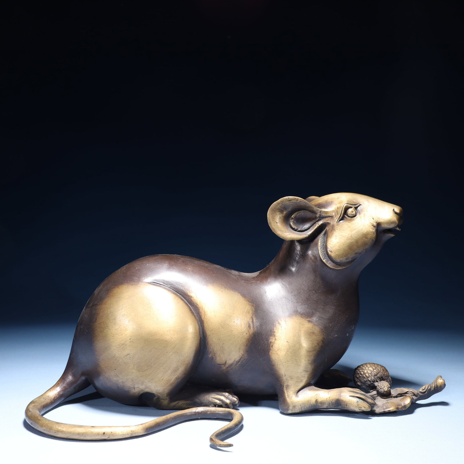 An Exquisite Bronze Squirrel Ornament: An Exquisite Bronze Squirrel Ornament,Qing Dynasty,China,Size:13inx5.9inx7.1in,Weight:3200g 铜松鼠摆件,中国清代