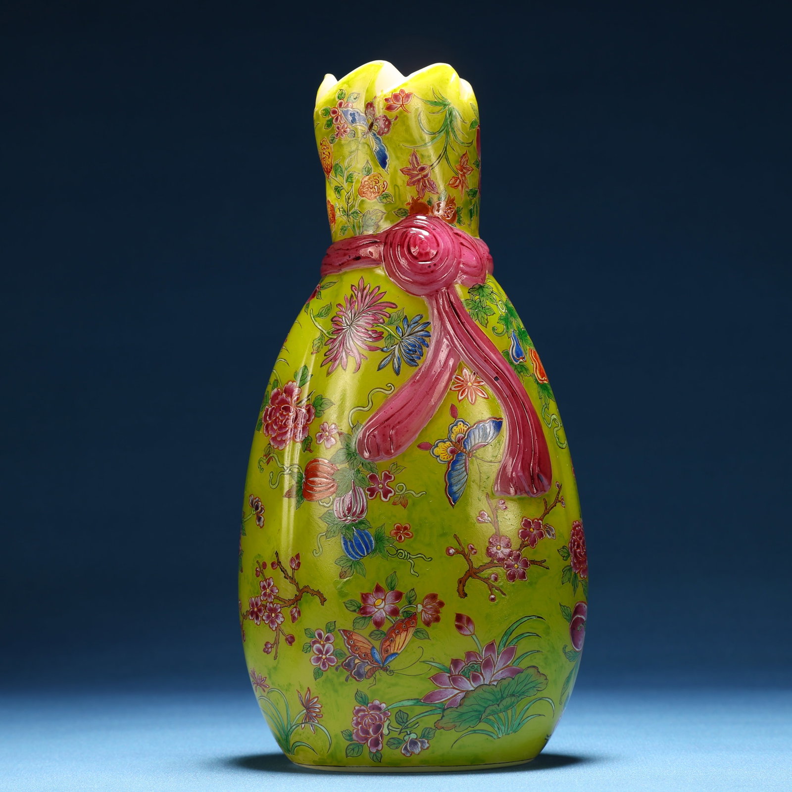 A Fine Glass Painted Enamel Butterfly and Flower Pattern Vase: A Fine Glass Painted Enamel Butterfly and Flower Pattern Vase,Qing Dynasty, China,Qianlong Four-character Mark,Size:3.7inx2inx7.3in 料器画珐琅蝴蝶花
