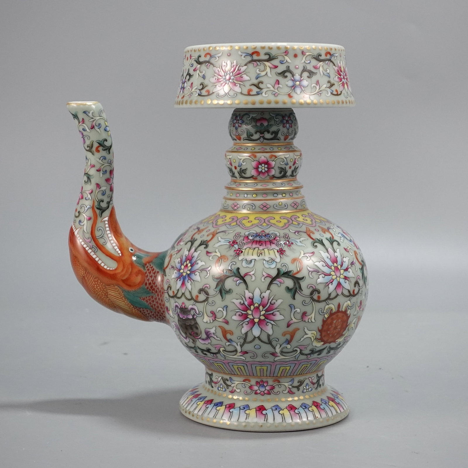 An Exquisite Famille-Rose Lotus Eight Treasures Pattern Pot: An Exquisite Famille-Rose Lotus Eight Treasures Pattern Pot,Qing Dynasty,China,Qianlong Six-character Mark,Size:8.3inx6.9in 粉彩缠枝莲八宝纹壶,